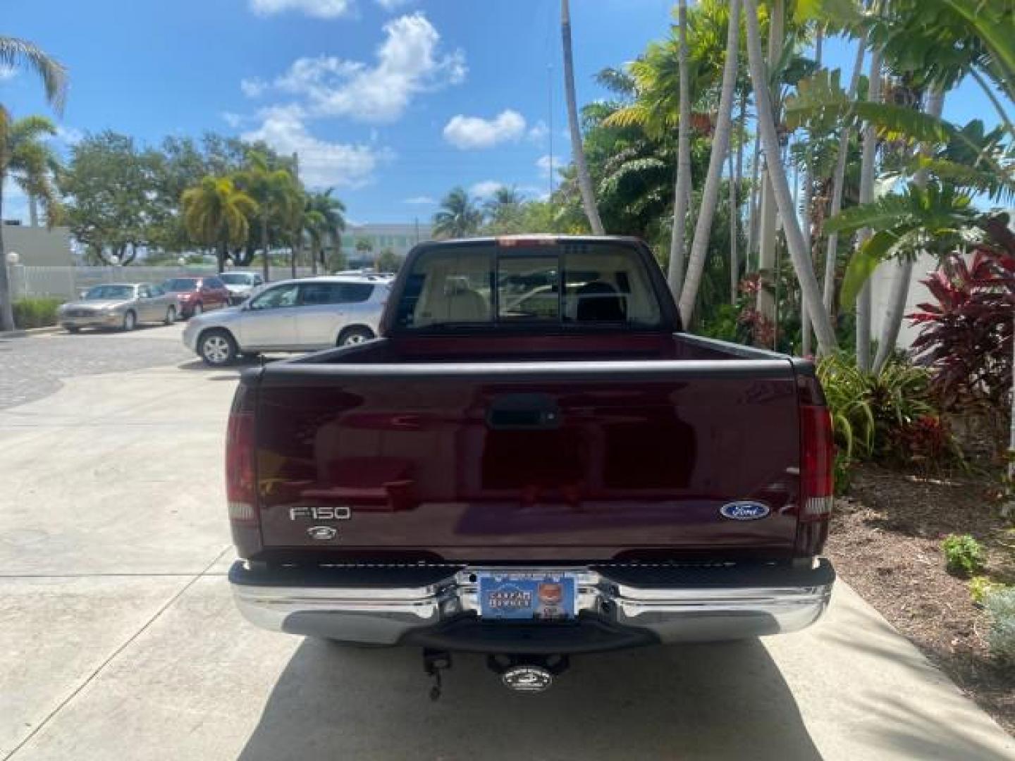 1997 Dark Toreador Red (CC/Met) /Medium Prarie Tan Ford F-150 XLT 1 OWNER LOW MILES 74,027 (1FTDX17W5VK) with an 4.6L EFI OHC V8 Triton Engine engine, Automatic transmission, located at 4701 North Dixie Hwy, Pompano Beach, FL, 33064, (954) 422-2889, 26.240938, -80.123474 - OUR WEBPAGE FLORIDACARS1.COM HAS OVER 100 PHOTOS AND FREE CARFAX LINK 1997 FORD F-150 XLT VIN: 1FTDX17W5VKB56866 1 F T D X 1 7 W 5 V K B 5 6 8 6 6 3 DOOR EXTENDED CAB PICKUP 4.6L V8 F GASOLINE REAR WHEEL DRIVE Top Features Cloth Seats Tow Hitch Basic Features ABS Brakes AM/FM Stereo Air Conditioning - Photo#6