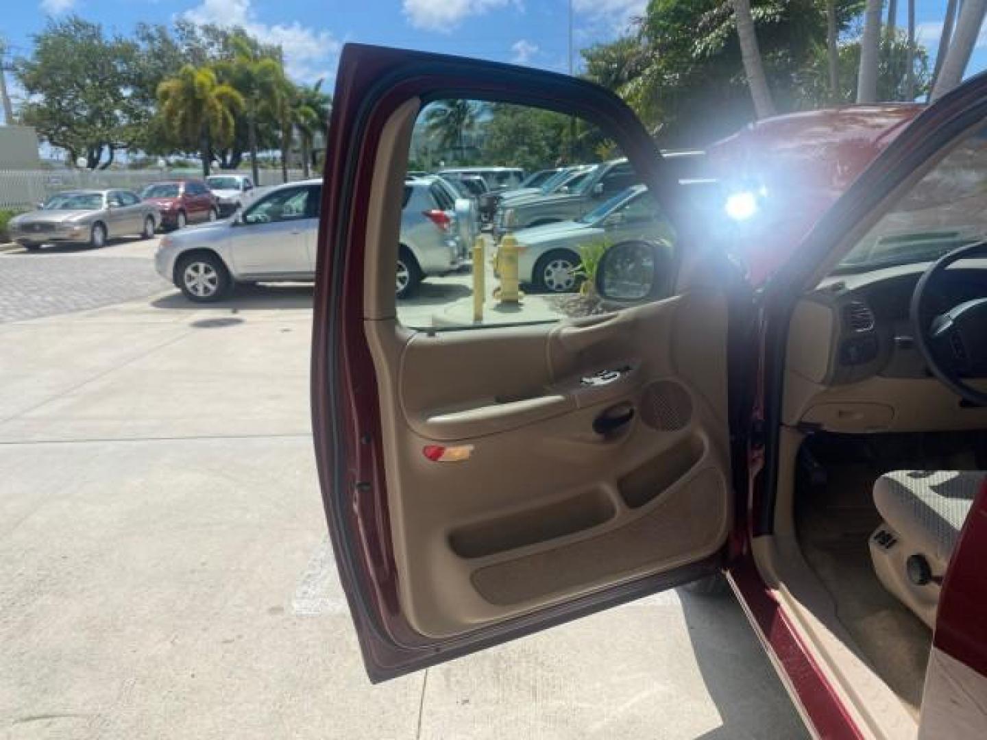 1997 Dark Toreador Red (CC/Met) /Medium Prarie Tan Ford F-150 XLT 1 OWNER LOW MILES 74,027 (1FTDX17W5VK) with an 4.6L EFI OHC V8 Triton Engine engine, Automatic transmission, located at 4701 North Dixie Hwy, Pompano Beach, FL, 33064, (954) 422-2889, 26.240938, -80.123474 - OUR WEBPAGE FLORIDACARS1.COM HAS OVER 100 PHOTOS AND FREE CARFAX LINK 1997 FORD F-150 XLT VIN: 1FTDX17W5VKB56866 1 F T D X 1 7 W 5 V K B 5 6 8 6 6 3 DOOR EXTENDED CAB PICKUP 4.6L V8 F GASOLINE REAR WHEEL DRIVE Top Features Cloth Seats Tow Hitch Basic Features ABS Brakes AM/FM Stereo Air Conditioning - Photo#9