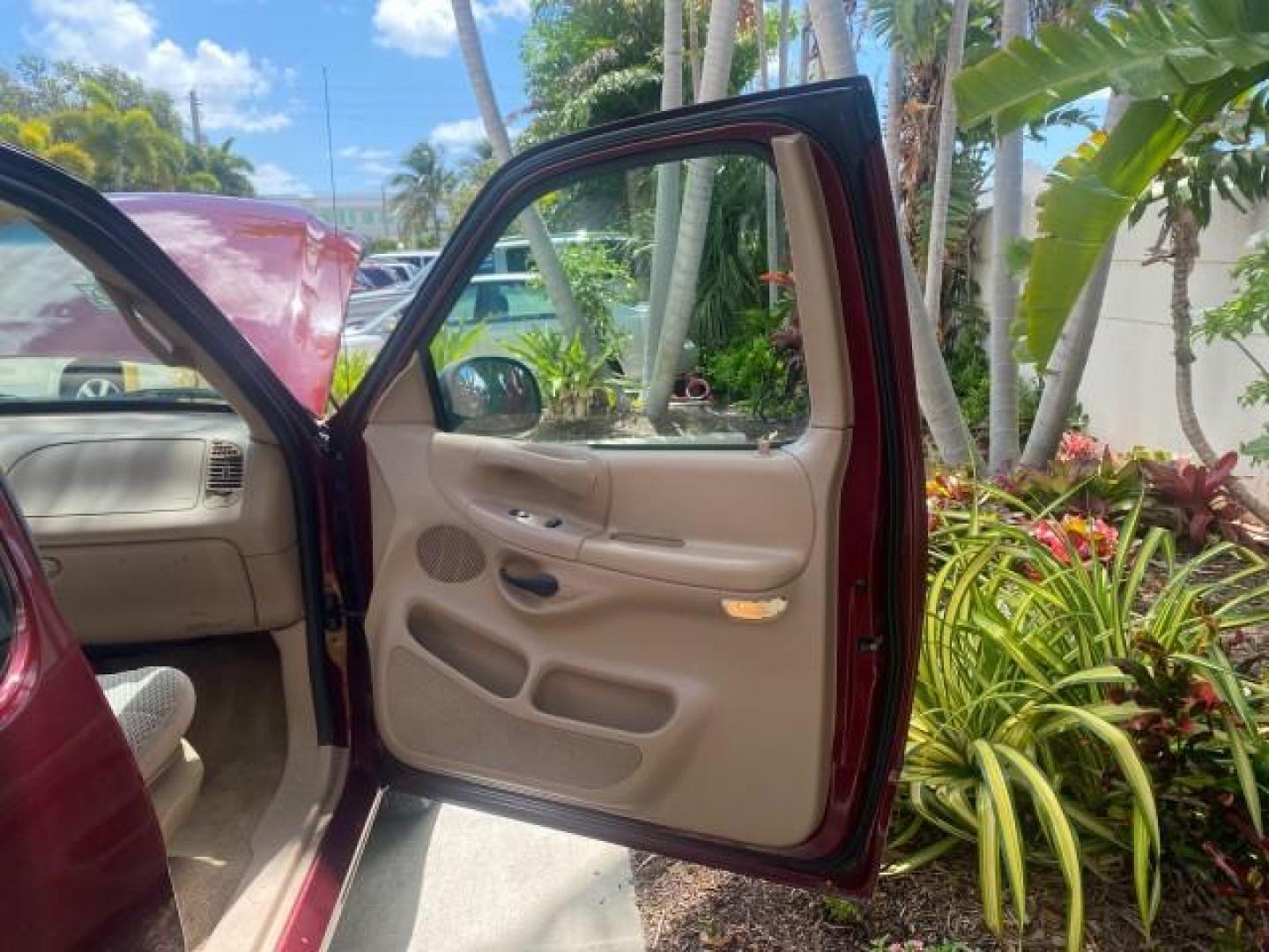 1997 Dark Toreador Red (CC/Met) /Medium Prarie Tan Ford F-150 XLT 1 OWNER LOW MILES 74,027 (1FTDX17W5VK) with an 4.6L EFI OHC V8 Triton Engine engine, Automatic transmission, located at 4701 North Dixie Hwy, Pompano Beach, FL, 33064, (954) 422-2889, 26.240938, -80.123474 - OUR WEBPAGE FLORIDACARS1.COM HAS OVER 100 PHOTOS AND FREE CARFAX LINK 1997 FORD F-150 XLT VIN: 1FTDX17W5VKB56866 1 F T D X 1 7 W 5 V K B 5 6 8 6 6 3 DOOR EXTENDED CAB PICKUP 4.6L V8 F GASOLINE REAR WHEEL DRIVE Top Features Cloth Seats Tow Hitch Basic Features ABS Brakes AM/FM Stereo Air Conditioning - Photo#11