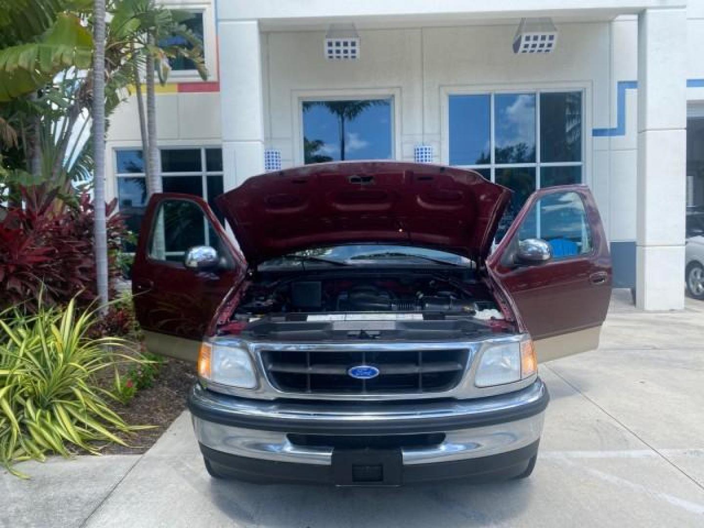 1997 Dark Toreador Red (CC/Met) /Medium Prarie Tan Ford F-150 XLT 1 OWNER LOW MILES 74,027 (1FTDX17W5VK) with an 4.6L EFI OHC V8 Triton Engine engine, Automatic transmission, located at 4701 North Dixie Hwy, Pompano Beach, FL, 33064, (954) 422-2889, 26.240938, -80.123474 - OUR WEBPAGE FLORIDACARS1.COM HAS OVER 100 PHOTOS AND FREE CARFAX LINK 1997 FORD F-150 XLT VIN: 1FTDX17W5VKB56866 1 F T D X 1 7 W 5 V K B 5 6 8 6 6 3 DOOR EXTENDED CAB PICKUP 4.6L V8 F GASOLINE REAR WHEEL DRIVE Top Features Cloth Seats Tow Hitch Basic Features ABS Brakes AM/FM Stereo Air Conditioning - Photo#16