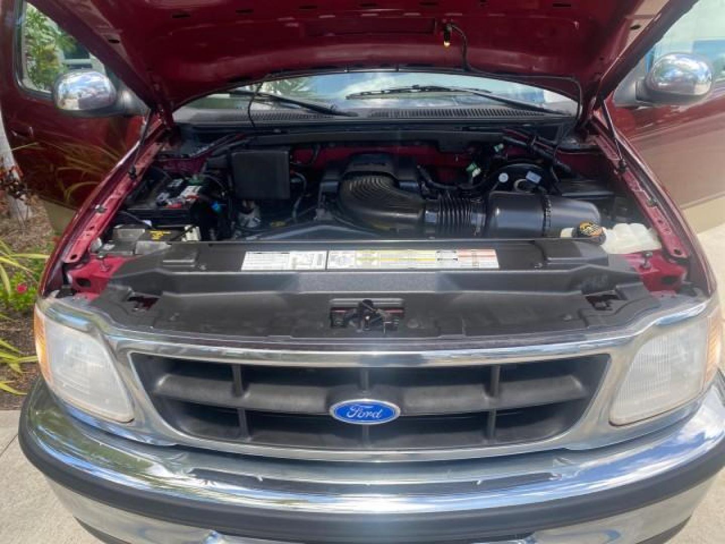 1997 Dark Toreador Red (CC/Met) /Medium Prarie Tan Ford F-150 XLT 1 OWNER LOW MILES 74,027 (1FTDX17W5VK) with an 4.6L EFI OHC V8 Triton Engine engine, Automatic transmission, located at 4701 North Dixie Hwy, Pompano Beach, FL, 33064, (954) 422-2889, 26.240938, -80.123474 - OUR WEBPAGE FLORIDACARS1.COM HAS OVER 100 PHOTOS AND FREE CARFAX LINK 1997 FORD F-150 XLT VIN: 1FTDX17W5VKB56866 1 F T D X 1 7 W 5 V K B 5 6 8 6 6 3 DOOR EXTENDED CAB PICKUP 4.6L V8 F GASOLINE REAR WHEEL DRIVE Top Features Cloth Seats Tow Hitch Basic Features ABS Brakes AM/FM Stereo Air Conditioning - Photo#17