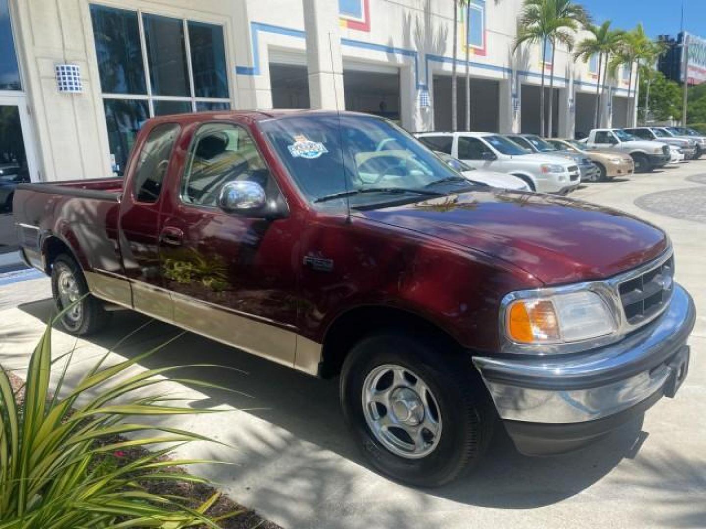 1997 Dark Toreador Red (CC/Met) /Medium Prarie Tan Ford F-150 XLT 1 OWNER LOW MILES 74,027 (1FTDX17W5VK) with an 4.6L EFI OHC V8 Triton Engine engine, Automatic transmission, located at 4701 North Dixie Hwy, Pompano Beach, FL, 33064, (954) 422-2889, 26.240938, -80.123474 - OUR WEBPAGE FLORIDACARS1.COM HAS OVER 100 PHOTOS AND FREE CARFAX LINK 1997 FORD F-150 XLT VIN: 1FTDX17W5VKB56866 1 F T D X 1 7 W 5 V K B 5 6 8 6 6 3 DOOR EXTENDED CAB PICKUP 4.6L V8 F GASOLINE REAR WHEEL DRIVE Top Features Cloth Seats Tow Hitch Basic Features ABS Brakes AM/FM Stereo Air Conditioning - Photo#24