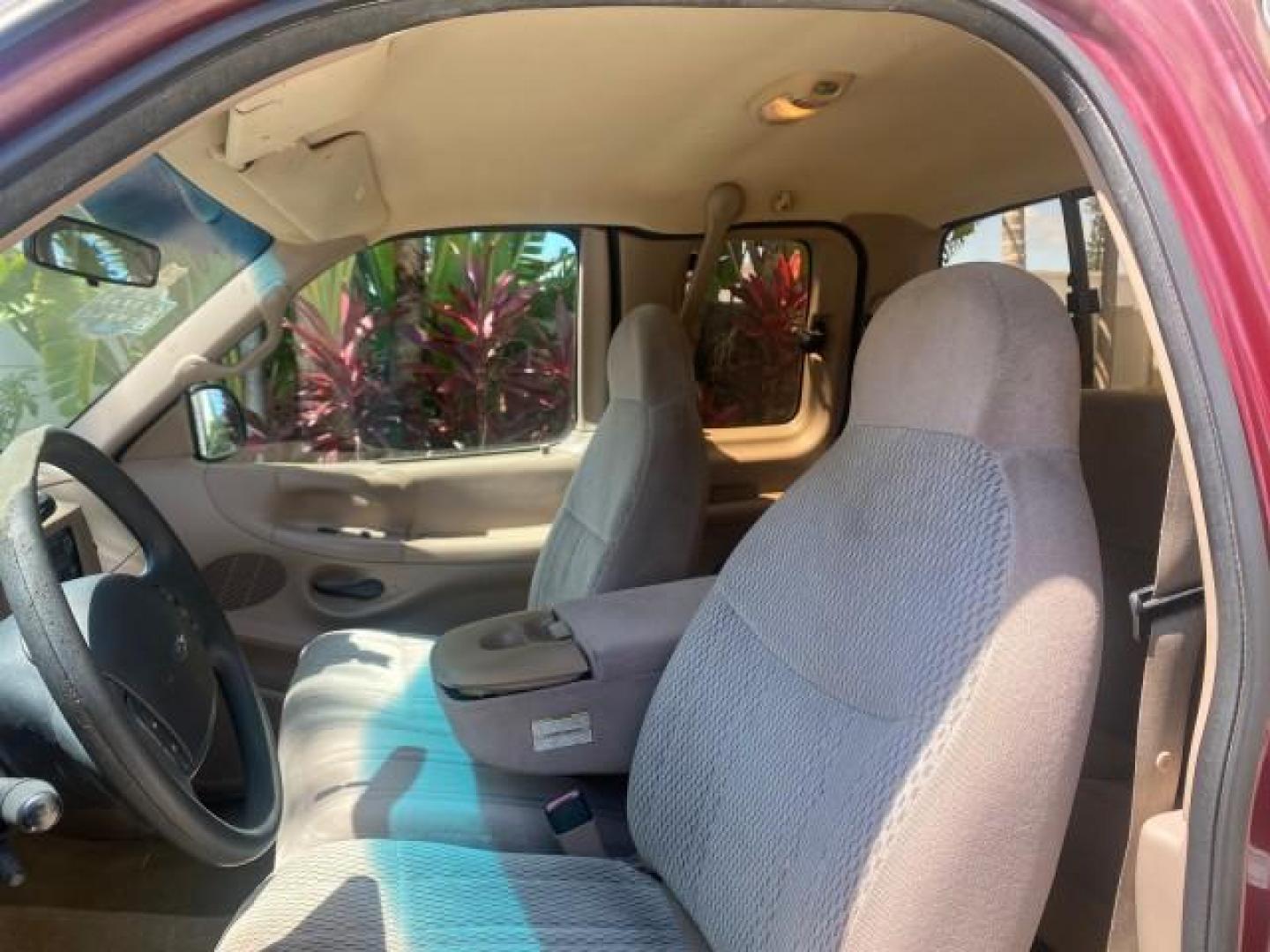 1997 Dark Toreador Red (CC/Met) /Medium Prarie Tan Ford F-150 XLT 1 OWNER LOW MILES 74,027 (1FTDX17W5VK) with an 4.6L EFI OHC V8 Triton Engine engine, Automatic transmission, located at 4701 North Dixie Hwy, Pompano Beach, FL, 33064, (954) 422-2889, 26.240938, -80.123474 - OUR WEBPAGE FLORIDACARS1.COM HAS OVER 100 PHOTOS AND FREE CARFAX LINK 1997 FORD F-150 XLT VIN: 1FTDX17W5VKB56866 1 F T D X 1 7 W 5 V K B 5 6 8 6 6 3 DOOR EXTENDED CAB PICKUP 4.6L V8 F GASOLINE REAR WHEEL DRIVE Top Features Cloth Seats Tow Hitch Basic Features ABS Brakes AM/FM Stereo Air Conditioning - Photo#34
