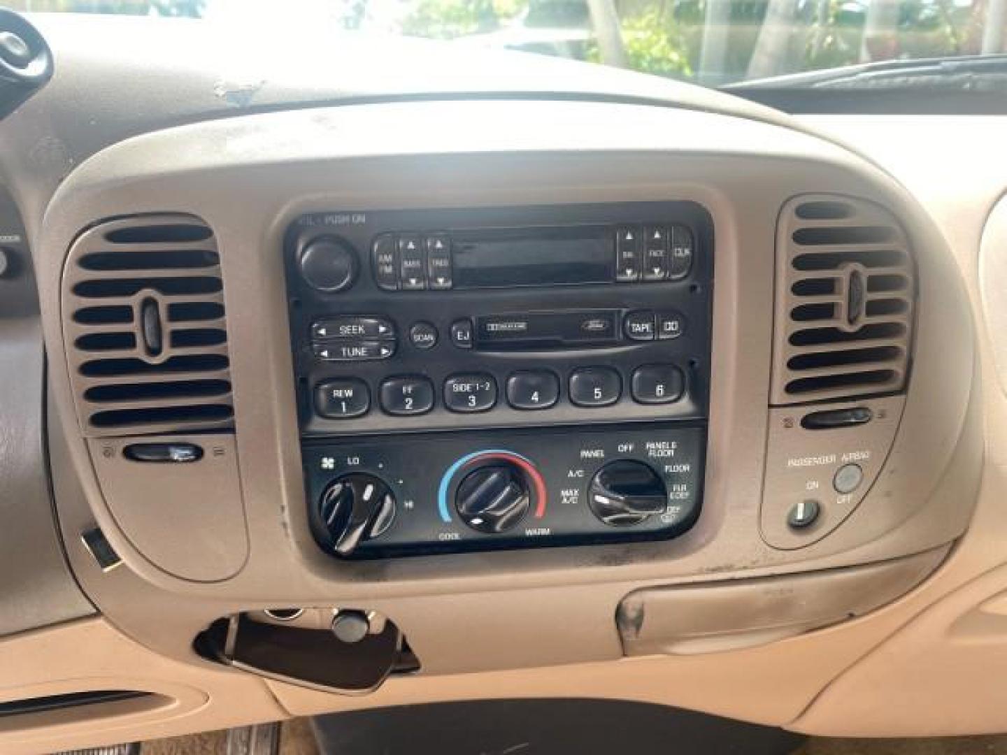 1997 Dark Toreador Red (CC/Met) /Medium Prarie Tan Ford F-150 XLT 1 OWNER LOW MILES 74,027 (1FTDX17W5VK) with an 4.6L EFI OHC V8 Triton Engine engine, Automatic transmission, located at 4701 North Dixie Hwy, Pompano Beach, FL, 33064, (954) 422-2889, 26.240938, -80.123474 - OUR WEBPAGE FLORIDACARS1.COM HAS OVER 100 PHOTOS AND FREE CARFAX LINK 1997 FORD F-150 XLT VIN: 1FTDX17W5VKB56866 1 F T D X 1 7 W 5 V K B 5 6 8 6 6 3 DOOR EXTENDED CAB PICKUP 4.6L V8 F GASOLINE REAR WHEEL DRIVE Top Features Cloth Seats Tow Hitch Basic Features ABS Brakes AM/FM Stereo Air Conditioning - Photo#49