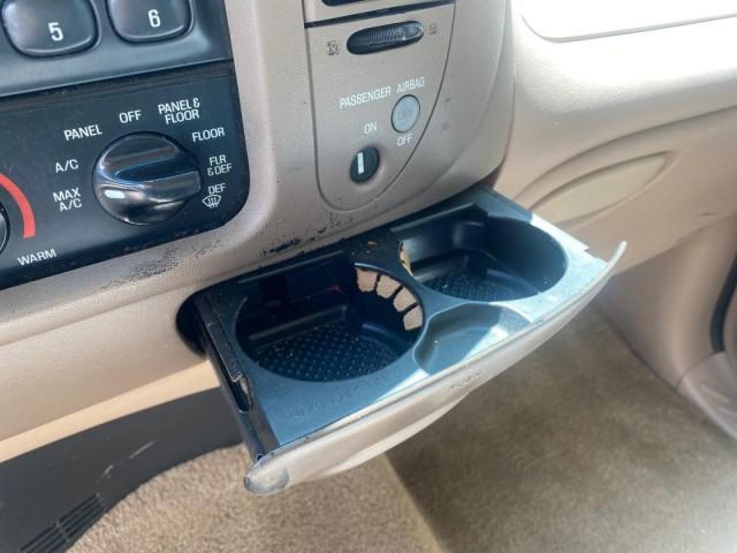 1997 Dark Toreador Red (CC/Met) /Medium Prarie Tan Ford F-150 XLT 1 OWNER LOW MILES 74,027 (1FTDX17W5VK) with an 4.6L EFI OHC V8 Triton Engine engine, Automatic transmission, located at 4701 North Dixie Hwy, Pompano Beach, FL, 33064, (954) 422-2889, 26.240938, -80.123474 - OUR WEBPAGE FLORIDACARS1.COM HAS OVER 100 PHOTOS AND FREE CARFAX LINK 1997 FORD F-150 XLT VIN: 1FTDX17W5VKB56866 1 F T D X 1 7 W 5 V K B 5 6 8 6 6 3 DOOR EXTENDED CAB PICKUP 4.6L V8 F GASOLINE REAR WHEEL DRIVE Top Features Cloth Seats Tow Hitch Basic Features ABS Brakes AM/FM Stereo Air Conditioning - Photo#52