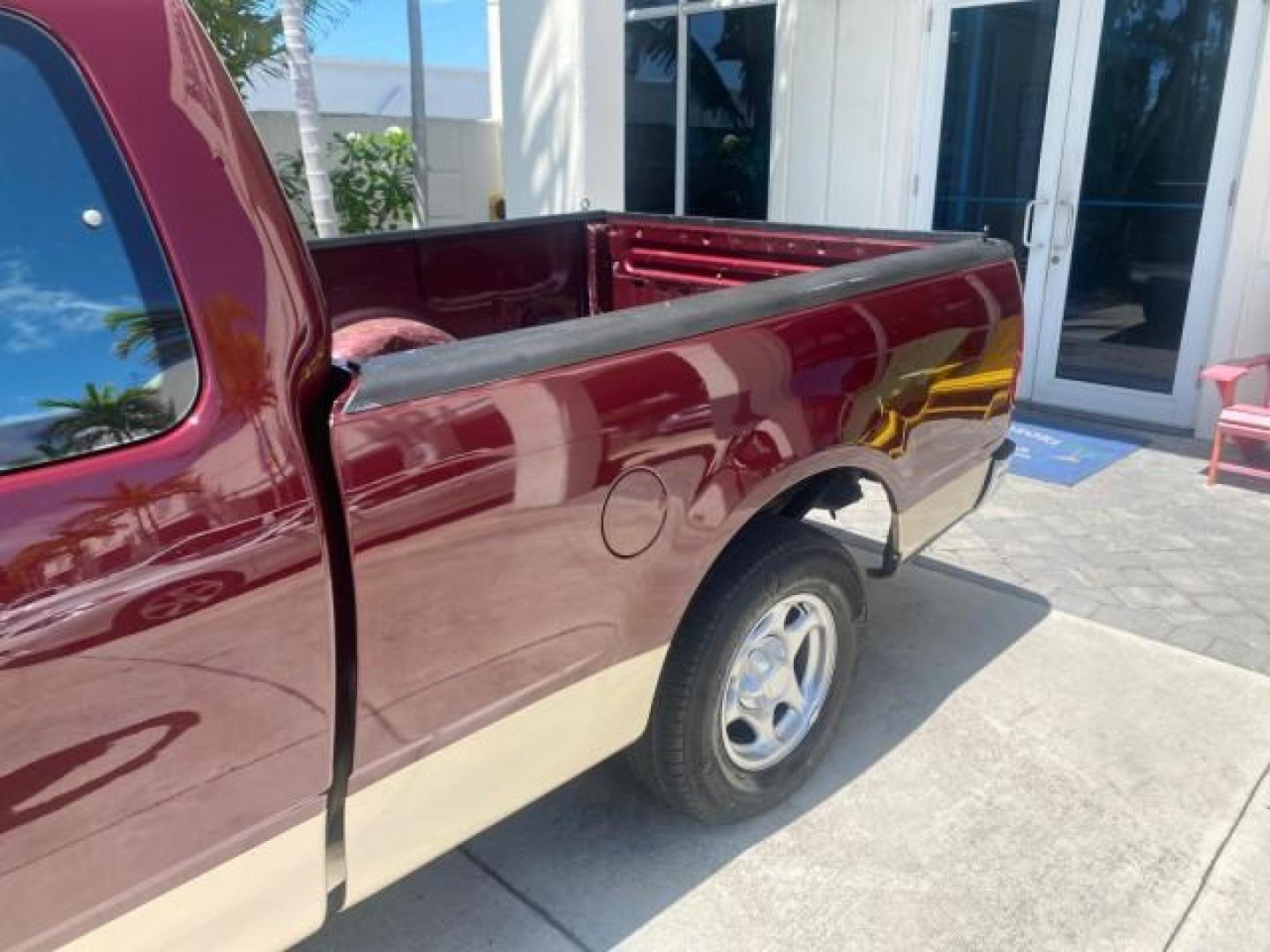 1997 Dark Toreador Red (CC/Met) /Medium Prarie Tan Ford F-150 XLT 1 OWNER LOW MILES 74,027 (1FTDX17W5VK) with an 4.6L EFI OHC V8 Triton Engine engine, Automatic transmission, located at 4701 North Dixie Hwy, Pompano Beach, FL, 33064, (954) 422-2889, 26.240938, -80.123474 - OUR WEBPAGE FLORIDACARS1.COM HAS OVER 100 PHOTOS AND FREE CARFAX LINK 1997 FORD F-150 XLT VIN: 1FTDX17W5VKB56866 1 F T D X 1 7 W 5 V K B 5 6 8 6 6 3 DOOR EXTENDED CAB PICKUP 4.6L V8 F GASOLINE REAR WHEEL DRIVE Top Features Cloth Seats Tow Hitch Basic Features ABS Brakes AM/FM Stereo Air Conditioning - Photo#64