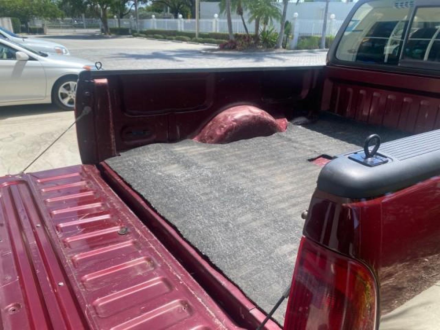 1997 Dark Toreador Red (CC/Met) /Medium Prarie Tan Ford F-150 XLT 1 OWNER LOW MILES 74,027 (1FTDX17W5VK) with an 4.6L EFI OHC V8 Triton Engine engine, Automatic transmission, located at 4701 North Dixie Hwy, Pompano Beach, FL, 33064, (954) 422-2889, 26.240938, -80.123474 - OUR WEBPAGE FLORIDACARS1.COM HAS OVER 100 PHOTOS AND FREE CARFAX LINK 1997 FORD F-150 XLT VIN: 1FTDX17W5VKB56866 1 F T D X 1 7 W 5 V K B 5 6 8 6 6 3 DOOR EXTENDED CAB PICKUP 4.6L V8 F GASOLINE REAR WHEEL DRIVE Top Features Cloth Seats Tow Hitch Basic Features ABS Brakes AM/FM Stereo Air Conditioning - Photo#81