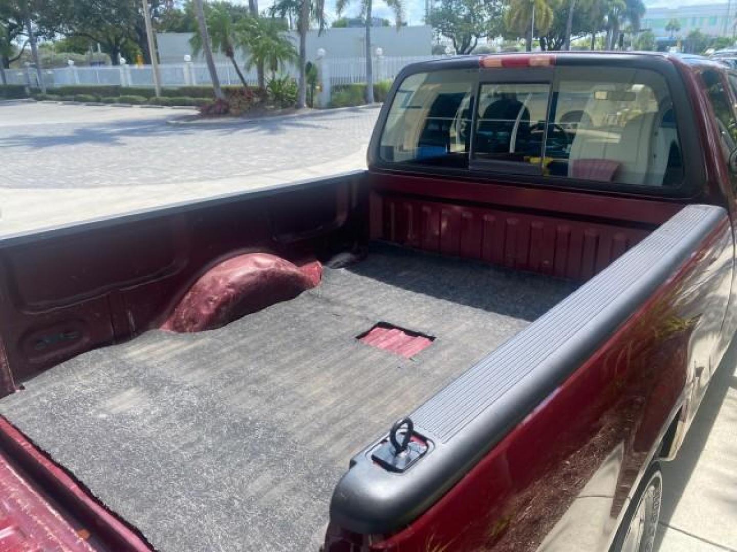 1997 Dark Toreador Red (CC/Met) /Medium Prarie Tan Ford F-150 XLT 1 OWNER LOW MILES 74,027 (1FTDX17W5VK) with an 4.6L EFI OHC V8 Triton Engine engine, Automatic transmission, located at 4701 North Dixie Hwy, Pompano Beach, FL, 33064, (954) 422-2889, 26.240938, -80.123474 - OUR WEBPAGE FLORIDACARS1.COM HAS OVER 100 PHOTOS AND FREE CARFAX LINK 1997 FORD F-150 XLT VIN: 1FTDX17W5VKB56866 1 F T D X 1 7 W 5 V K B 5 6 8 6 6 3 DOOR EXTENDED CAB PICKUP 4.6L V8 F GASOLINE REAR WHEEL DRIVE Top Features Cloth Seats Tow Hitch Basic Features ABS Brakes AM/FM Stereo Air Conditioning - Photo#82