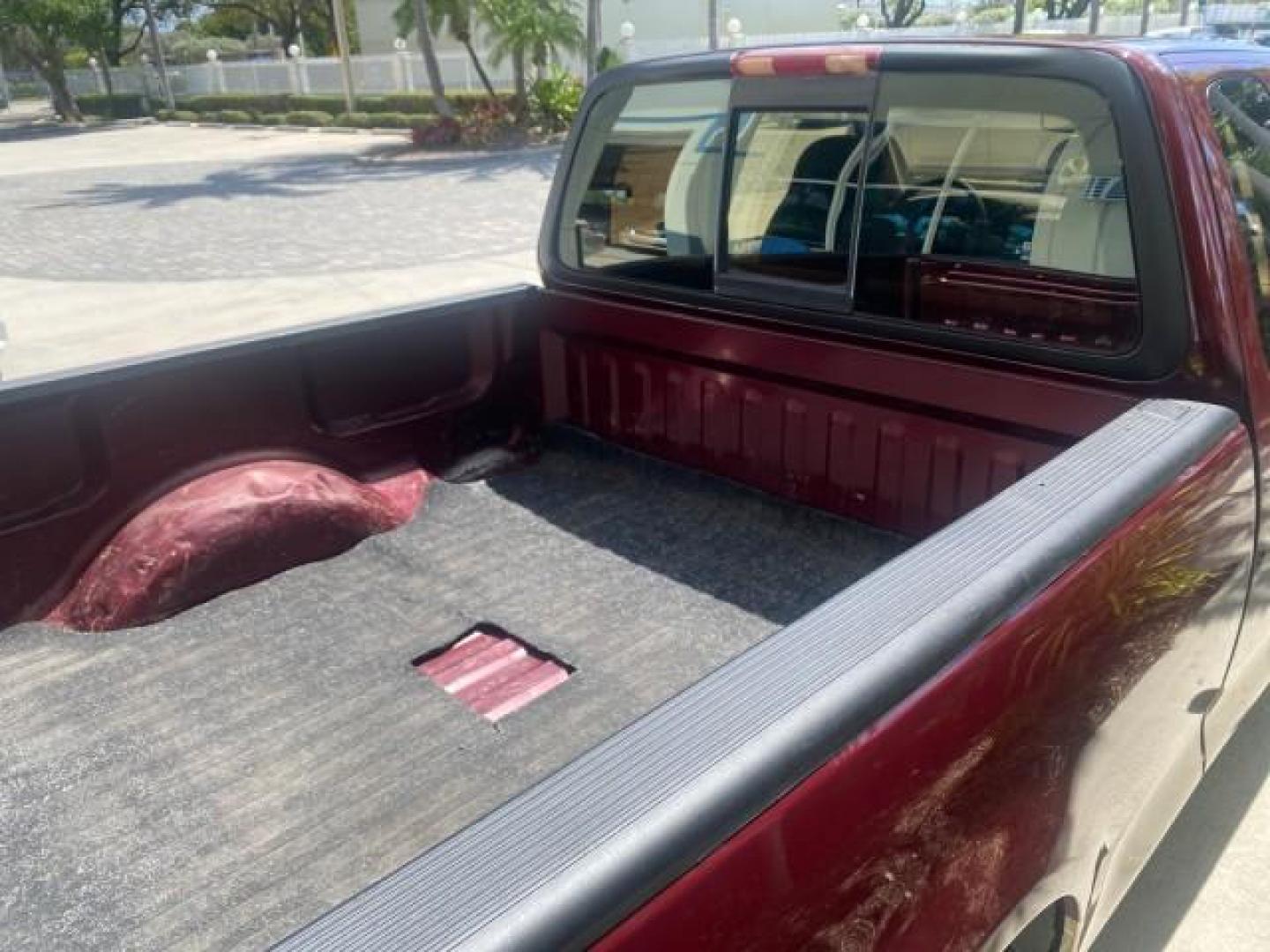 1997 Dark Toreador Red (CC/Met) /Medium Prarie Tan Ford F-150 XLT 1 OWNER LOW MILES 74,027 (1FTDX17W5VK) with an 4.6L EFI OHC V8 Triton Engine engine, Automatic transmission, located at 4701 North Dixie Hwy, Pompano Beach, FL, 33064, (954) 422-2889, 26.240938, -80.123474 - OUR WEBPAGE FLORIDACARS1.COM HAS OVER 100 PHOTOS AND FREE CARFAX LINK 1997 FORD F-150 XLT VIN: 1FTDX17W5VKB56866 1 F T D X 1 7 W 5 V K B 5 6 8 6 6 3 DOOR EXTENDED CAB PICKUP 4.6L V8 F GASOLINE REAR WHEEL DRIVE Top Features Cloth Seats Tow Hitch Basic Features ABS Brakes AM/FM Stereo Air Conditioning - Photo#91