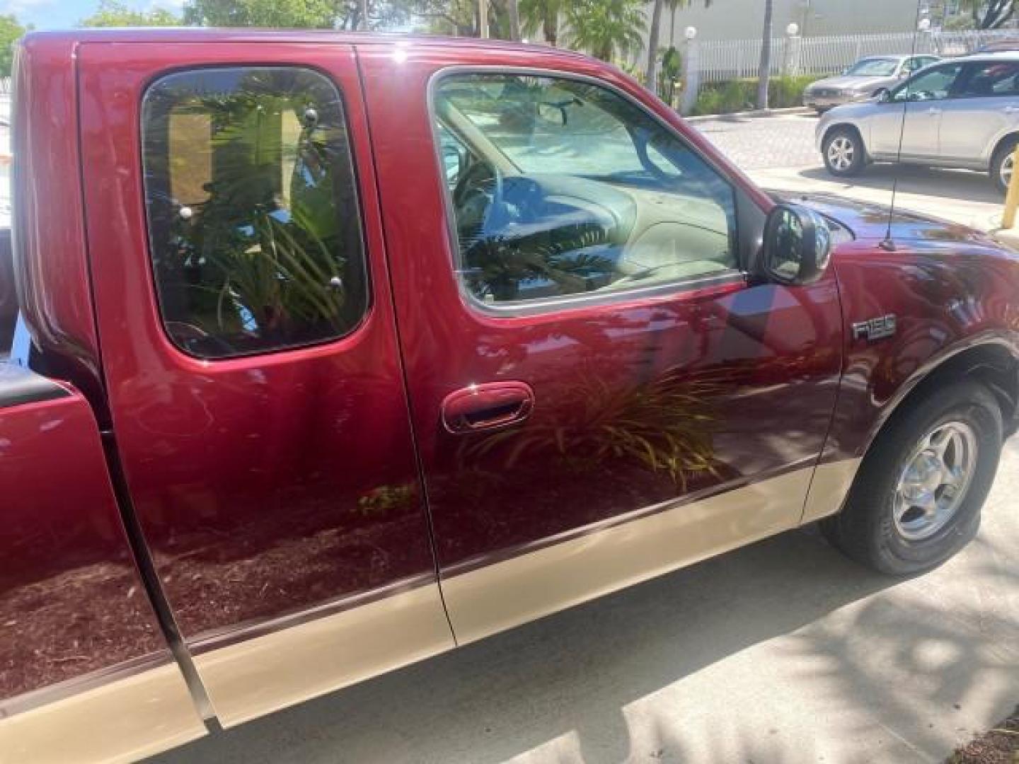 1997 Dark Toreador Red (CC/Met) /Medium Prarie Tan Ford F-150 XLT 1 OWNER LOW MILES 74,027 (1FTDX17W5VK) with an 4.6L EFI OHC V8 Triton Engine engine, Automatic transmission, located at 4701 North Dixie Hwy, Pompano Beach, FL, 33064, (954) 422-2889, 26.240938, -80.123474 - OUR WEBPAGE FLORIDACARS1.COM HAS OVER 100 PHOTOS AND FREE CARFAX LINK 1997 FORD F-150 XLT VIN: 1FTDX17W5VKB56866 1 F T D X 1 7 W 5 V K B 5 6 8 6 6 3 DOOR EXTENDED CAB PICKUP 4.6L V8 F GASOLINE REAR WHEEL DRIVE Top Features Cloth Seats Tow Hitch Basic Features ABS Brakes AM/FM Stereo Air Conditioning - Photo#94