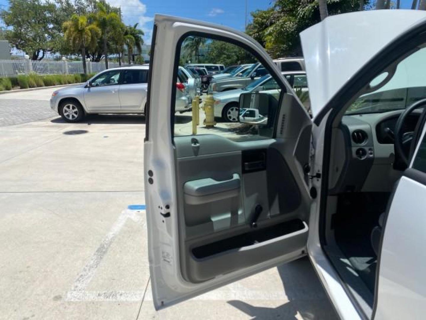 2005 Oxford White /Flint Ford F-150 XL 1 OWNER LOW MILES 23,679 (1FTRF12255N) with an 4.2L EFI V6 Engine engine, Automatic transmission, located at 4701 North Dixie Hwy, Pompano Beach, FL, 33064, (954) 422-2889, 26.240938, -80.123474 - OUR WEBPAGE FLORIDACARS1.COM HAS OVER 100 PHOTOS AND FREE CARFAX LINK 2005 FORD F-150 STX VIN:1FTRF12255NB53851 PICKUP 4.2L V6 F OHV GASOLINE REAR WHEEL DRIVE Top Features Vinyl Seats Basic Features ABS Brakes AM/FM Stereo Air Conditioning Automatic Transmission CD Audio Presenting one of the finest - Photo#9