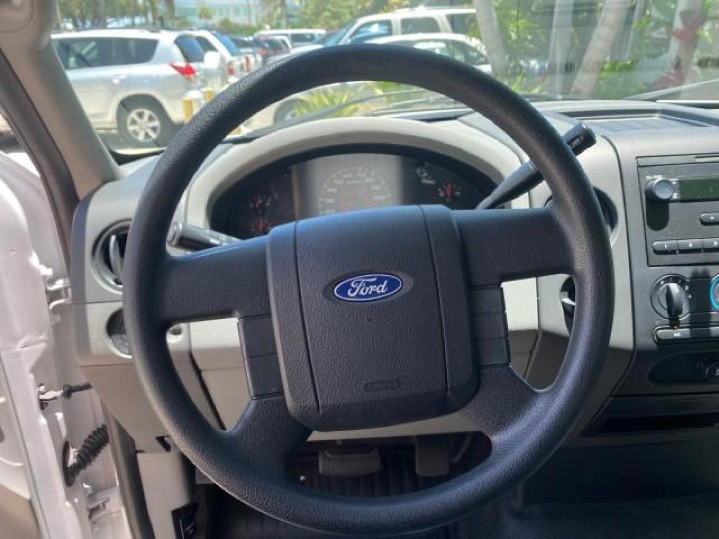 2005 Oxford White /Flint Ford F-150 XL 1 OWNER LOW MILES 23,679 (1FTRF12255N) with an 4.2L EFI V6 Engine engine, Automatic transmission, located at 4701 North Dixie Hwy, Pompano Beach, FL, 33064, (954) 422-2889, 26.240938, -80.123474 - OUR WEBPAGE FLORIDACARS1.COM HAS OVER 100 PHOTOS AND FREE CARFAX LINK 2005 FORD F-150 STX VIN:1FTRF12255NB53851 PICKUP 4.2L V6 F OHV GASOLINE REAR WHEEL DRIVE Top Features Vinyl Seats Basic Features ABS Brakes AM/FM Stereo Air Conditioning Automatic Transmission CD Audio Presenting one of the finest - Photo#38
