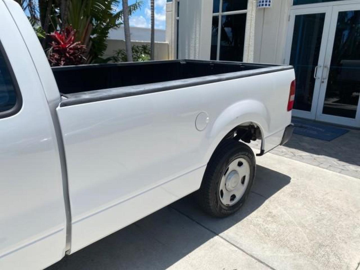 2005 Oxford White /Flint Ford F-150 XL 1 OWNER LOW MILES 23,679 (1FTRF12255N) with an 4.2L EFI V6 Engine engine, Automatic transmission, located at 4701 North Dixie Hwy, Pompano Beach, FL, 33064, (954) 422-2889, 26.240938, -80.123474 - OUR WEBPAGE FLORIDACARS1.COM HAS OVER 100 PHOTOS AND FREE CARFAX LINK 2005 FORD F-150 STX VIN:1FTRF12255NB53851 PICKUP 4.2L V6 F OHV GASOLINE REAR WHEEL DRIVE Top Features Vinyl Seats Basic Features ABS Brakes AM/FM Stereo Air Conditioning Automatic Transmission CD Audio Presenting one of the finest - Photo#61