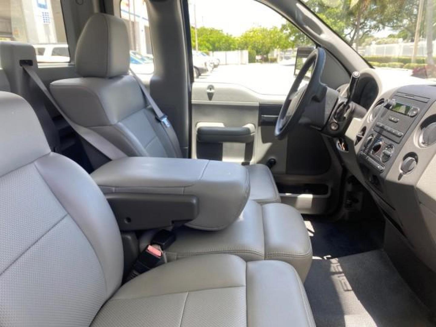 2005 Oxford White /Flint Ford F-150 XL 1 OWNER LOW MILES 23,679 (1FTRF12255N) with an 4.2L EFI V6 Engine engine, Automatic transmission, located at 4701 North Dixie Hwy, Pompano Beach, FL, 33064, (954) 422-2889, 26.240938, -80.123474 - OUR WEBPAGE FLORIDACARS1.COM HAS OVER 100 PHOTOS AND FREE CARFAX LINK 2005 FORD F-150 STX VIN:1FTRF12255NB53851 PICKUP 4.2L V6 F OHV GASOLINE REAR WHEEL DRIVE Top Features Vinyl Seats Basic Features ABS Brakes AM/FM Stereo Air Conditioning Automatic Transmission CD Audio Presenting one of the finest - Photo#95