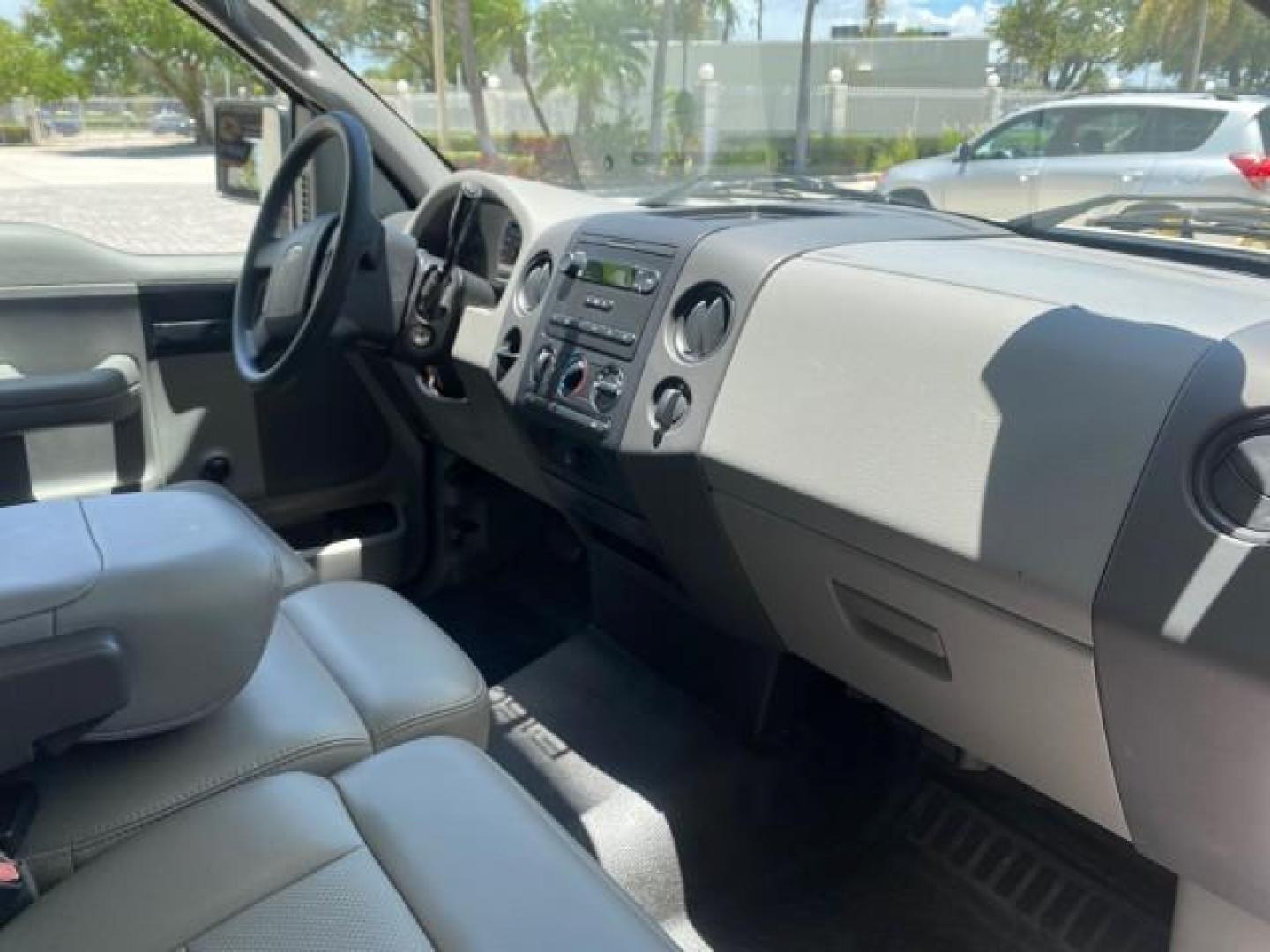 2005 Oxford White /Flint Ford F-150 XL 1 OWNER LOW MILES 23,679 (1FTRF12255N) with an 4.2L EFI V6 Engine engine, Automatic transmission, located at 4701 North Dixie Hwy, Pompano Beach, FL, 33064, (954) 422-2889, 26.240938, -80.123474 - OUR WEBPAGE FLORIDACARS1.COM HAS OVER 100 PHOTOS AND FREE CARFAX LINK 2005 FORD F-150 STX VIN:1FTRF12255NB53851 PICKUP 4.2L V6 F OHV GASOLINE REAR WHEEL DRIVE Top Features Vinyl Seats Basic Features ABS Brakes AM/FM Stereo Air Conditioning Automatic Transmission CD Audio Presenting one of the finest - Photo#97