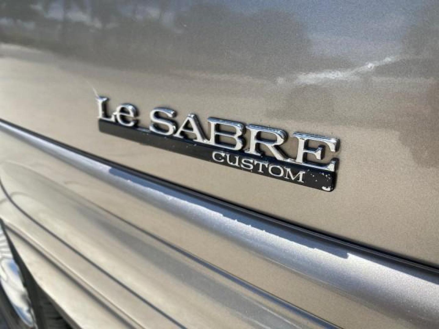 2000 Light Bronzemist Metallic /Medium Gray Buick LeSabre Custom LOW MILES 63,335 (1G4HP54K1YU) with an 3.8L SFI V6 3800 Series II Engine engine, Automatic transmission, located at 4701 North Dixie Hwy, Pompano Beach, FL, 33064, (954) 422-2889, 26.240938, -80.123474 - OUR WEBPAGE FLORIDACARS1.COM HAS OVER 100 PHOTOS AND FREE CARFAX LINK 2000 BUICK LESABRE CUSTOM VIN: 1G4HP54K1YU113799 1 G 4 H P 5 4 K 1 Y U 1 1 3 7 9 9 SEDAN 4 DR 3.8L V6 F 12V GASOLINE FRONT WHEEL DRIVE Top Features Cloth Seats Basic Features ABS Brakes AM/FM Stereo Air Conditioning Automatic Tran - Photo#73