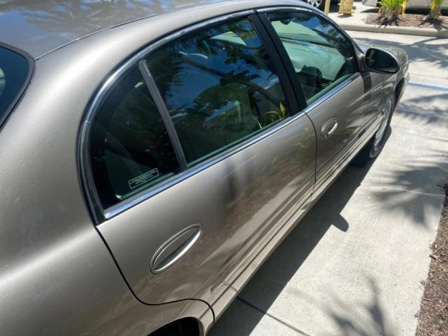 2000 Light Bronzemist Metallic /Medium Gray Buick LeSabre Custom LOW MILES 63,335 (1G4HP54K1YU) with an 3.8L SFI V6 3800 Series II Engine engine, Automatic transmission, located at 4701 North Dixie Hwy, Pompano Beach, FL, 33064, (954) 422-2889, 26.240938, -80.123474 - OUR WEBPAGE FLORIDACARS1.COM HAS OVER 100 PHOTOS AND FREE CARFAX LINK 2000 BUICK LESABRE CUSTOM VIN: 1G4HP54K1YU113799 1 G 4 H P 5 4 K 1 Y U 1 1 3 7 9 9 SEDAN 4 DR 3.8L V6 F 12V GASOLINE FRONT WHEEL DRIVE Top Features Cloth Seats Basic Features ABS Brakes AM/FM Stereo Air Conditioning Automatic Tran - Photo#83