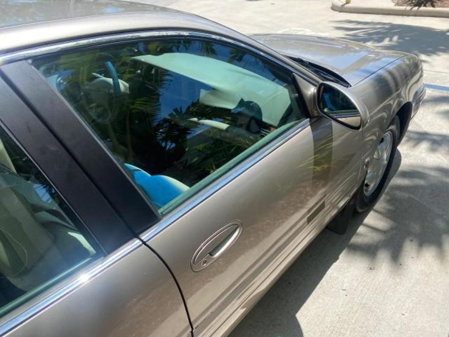 2000 Light Bronzemist Metallic /Medium Gray Buick LeSabre Custom LOW MILES 63,335 (1G4HP54K1YU) with an 3.8L SFI V6 3800 Series II Engine engine, Automatic transmission, located at 4701 North Dixie Hwy, Pompano Beach, FL, 33064, (954) 422-2889, 26.240938, -80.123474 - OUR WEBPAGE FLORIDACARS1.COM HAS OVER 100 PHOTOS AND FREE CARFAX LINK 2000 BUICK LESABRE CUSTOM VIN: 1G4HP54K1YU113799 1 G 4 H P 5 4 K 1 Y U 1 1 3 7 9 9 SEDAN 4 DR 3.8L V6 F 12V GASOLINE FRONT WHEEL DRIVE Top Features Cloth Seats Basic Features ABS Brakes AM/FM Stereo Air Conditioning Automatic Tran - Photo#92