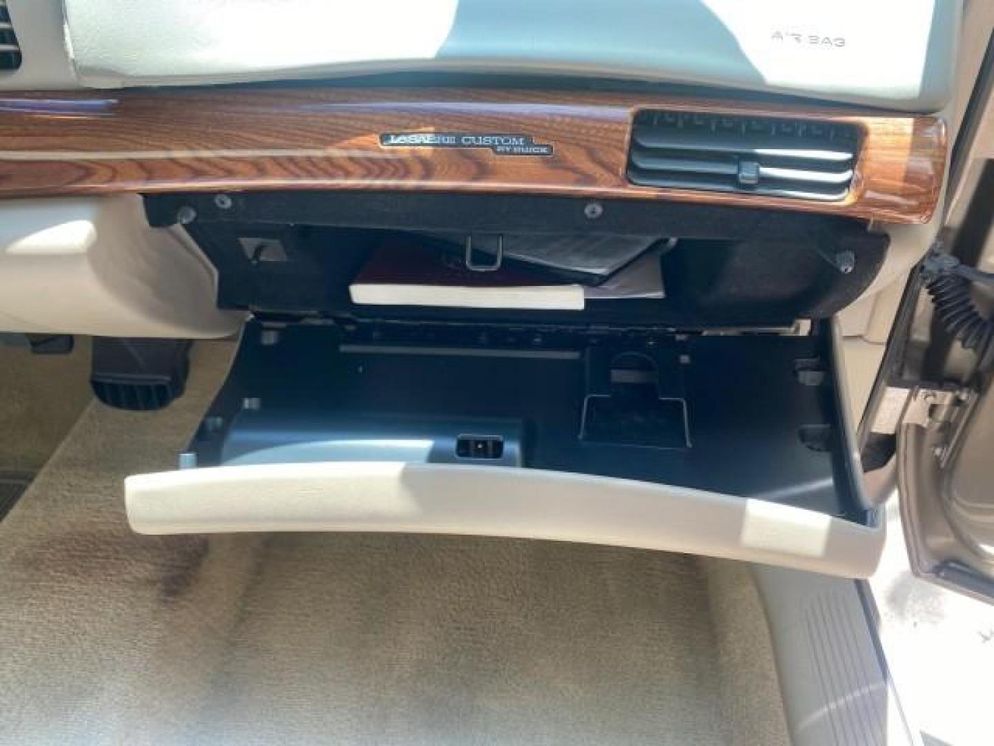 2000 Light Bronzemist Metallic /Medium Gray Buick LeSabre Custom LOW MILES 63,335 (1G4HP54K1YU) with an 3.8L SFI V6 3800 Series II Engine engine, Automatic transmission, located at 4701 North Dixie Hwy, Pompano Beach, FL, 33064, (954) 422-2889, 26.240938, -80.123474 - OUR WEBPAGE FLORIDACARS1.COM HAS OVER 100 PHOTOS AND FREE CARFAX LINK 2000 BUICK LESABRE CUSTOM VIN: 1G4HP54K1YU113799 1 G 4 H P 5 4 K 1 Y U 1 1 3 7 9 9 SEDAN 4 DR 3.8L V6 F 12V GASOLINE FRONT WHEEL DRIVE Top Features Cloth Seats Basic Features ABS Brakes AM/FM Stereo Air Conditioning Automatic Tran - Photo#89