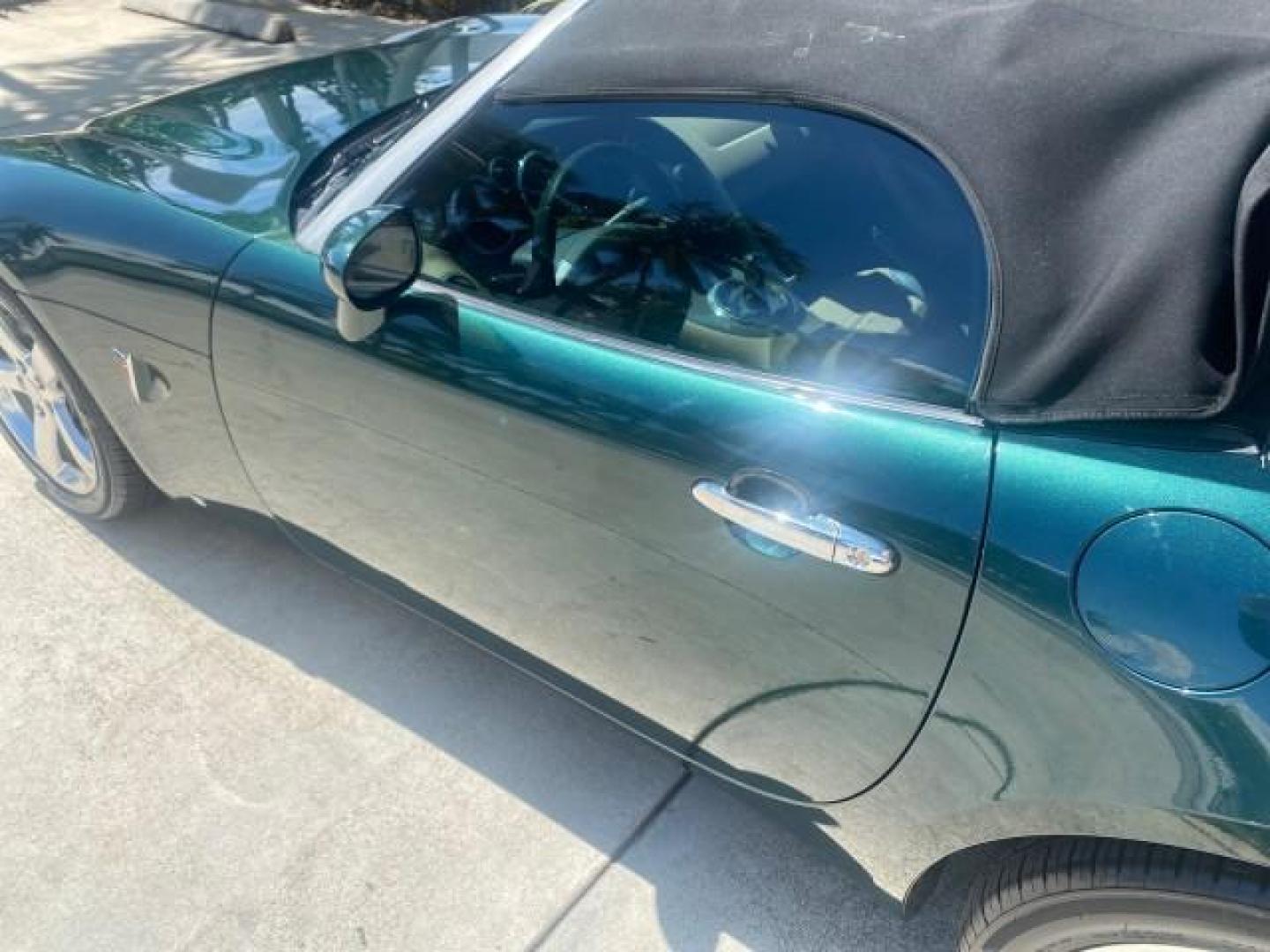 2006 Envious Emerald Green Met /Steel/Sand Pontiac Solstice 1 OWNER LOW MILES 17,744 (1G2MB35B76Y) with an Ecotec 2.4L DOHC 4-Cyl SFI Aluminum Engine engine, Manual transmission, located at 4701 North Dixie Hwy, Pompano Beach, FL, 33064, (954) 422-2889, 26.240938, -80.123474 - OUR WEBPAGE FLORIDACARS1.COM HAS OVER 100 PHOTOS AND FREE CARFAX LINK 2006 PONTIAC SOLSTICE VIN: 1G2MB35B76Y116186 1 G 2 M B 3 5 B 7 6 Y 1 1 6 1 8 6 CONVERTIBLE 2.4L I4 F DOHC GASOLINE REAR WHEEL DRIVE Top Features Alloy Wheels Bluetooth Technology Convenience Package Leather Seats Soft Top Basic Fe - Photo#25