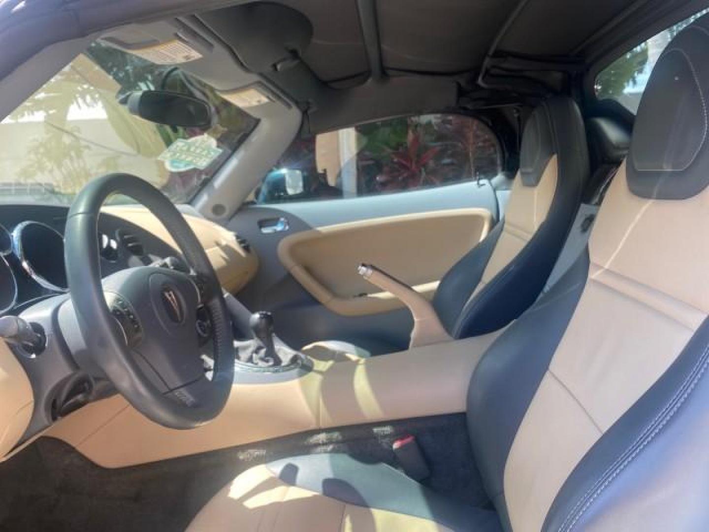 2006 Envious Emerald Green Met /Steel/Sand Pontiac Solstice 1 OWNER LOW MILES 17,744 (1G2MB35B76Y) with an Ecotec 2.4L DOHC 4-Cyl SFI Aluminum Engine engine, Manual transmission, located at 4701 North Dixie Hwy, Pompano Beach, FL, 33064, (954) 422-2889, 26.240938, -80.123474 - OUR WEBPAGE FLORIDACARS1.COM HAS OVER 100 PHOTOS AND FREE CARFAX LINK 2006 PONTIAC SOLSTICE VIN: 1G2MB35B76Y116186 1 G 2 M B 3 5 B 7 6 Y 1 1 6 1 8 6 CONVERTIBLE 2.4L I4 F DOHC GASOLINE REAR WHEEL DRIVE Top Features Alloy Wheels Bluetooth Technology Convenience Package Leather Seats Soft Top Basic Fe - Photo#35