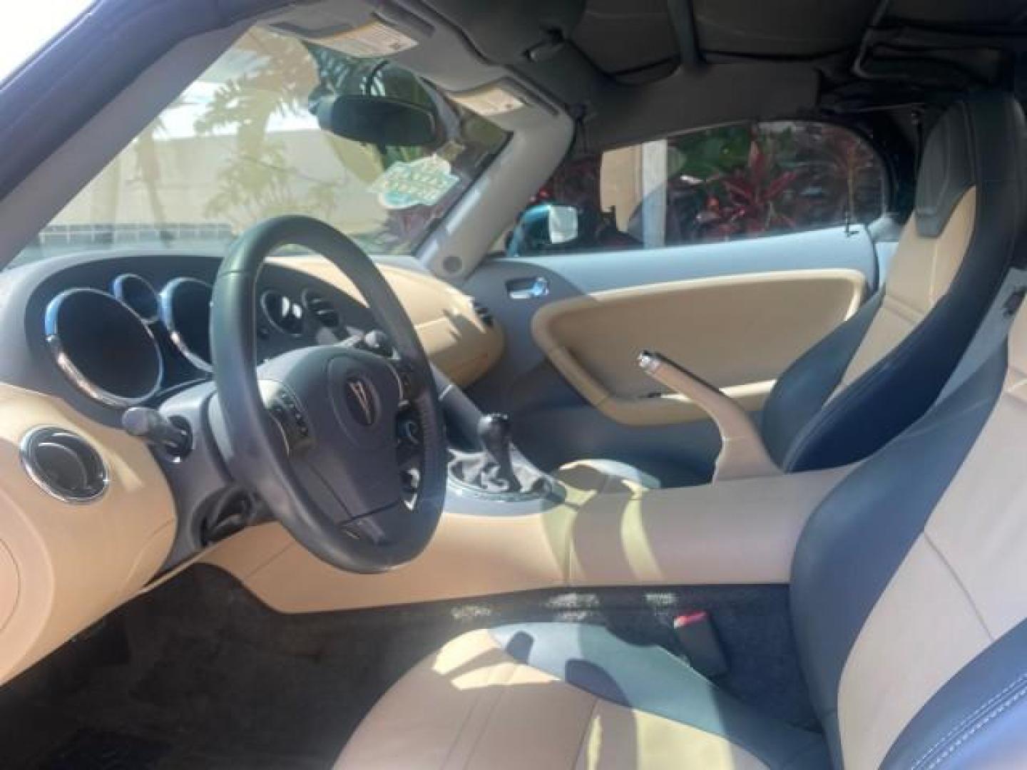 2006 Envious Emerald Green Met /Steel/Sand Pontiac Solstice 1 OWNER LOW MILES 17,744 (1G2MB35B76Y) with an Ecotec 2.4L DOHC 4-Cyl SFI Aluminum Engine engine, Manual transmission, located at 4701 North Dixie Hwy, Pompano Beach, FL, 33064, (954) 422-2889, 26.240938, -80.123474 - OUR WEBPAGE FLORIDACARS1.COM HAS OVER 100 PHOTOS AND FREE CARFAX LINK 2006 PONTIAC SOLSTICE VIN: 1G2MB35B76Y116186 1 G 2 M B 3 5 B 7 6 Y 1 1 6 1 8 6 CONVERTIBLE 2.4L I4 F DOHC GASOLINE REAR WHEEL DRIVE Top Features Alloy Wheels Bluetooth Technology Convenience Package Leather Seats Soft Top Basic Fe - Photo#36