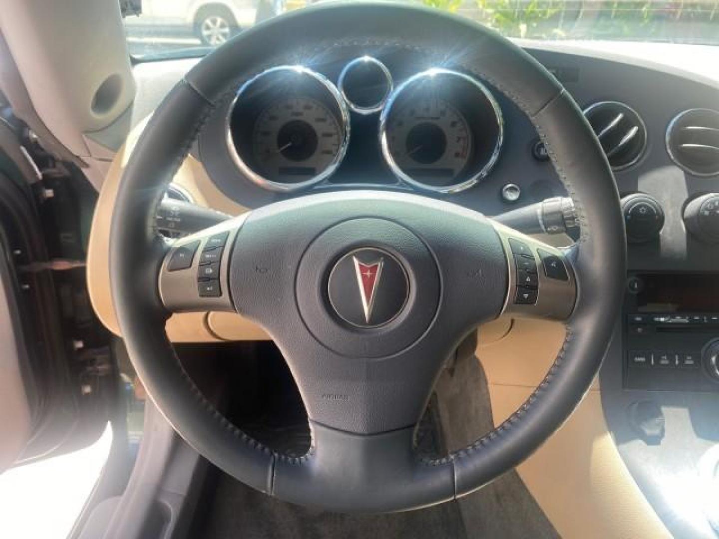 2006 Envious Emerald Green Met /Steel/Sand Pontiac Solstice 1 OWNER LOW MILES 17,744 (1G2MB35B76Y) with an Ecotec 2.4L DOHC 4-Cyl SFI Aluminum Engine engine, Manual transmission, located at 4701 North Dixie Hwy, Pompano Beach, FL, 33064, (954) 422-2889, 26.240938, -80.123474 - OUR WEBPAGE FLORIDACARS1.COM HAS OVER 100 PHOTOS AND FREE CARFAX LINK 2006 PONTIAC SOLSTICE VIN: 1G2MB35B76Y116186 1 G 2 M B 3 5 B 7 6 Y 1 1 6 1 8 6 CONVERTIBLE 2.4L I4 F DOHC GASOLINE REAR WHEEL DRIVE Top Features Alloy Wheels Bluetooth Technology Convenience Package Leather Seats Soft Top Basic Fe - Photo#38