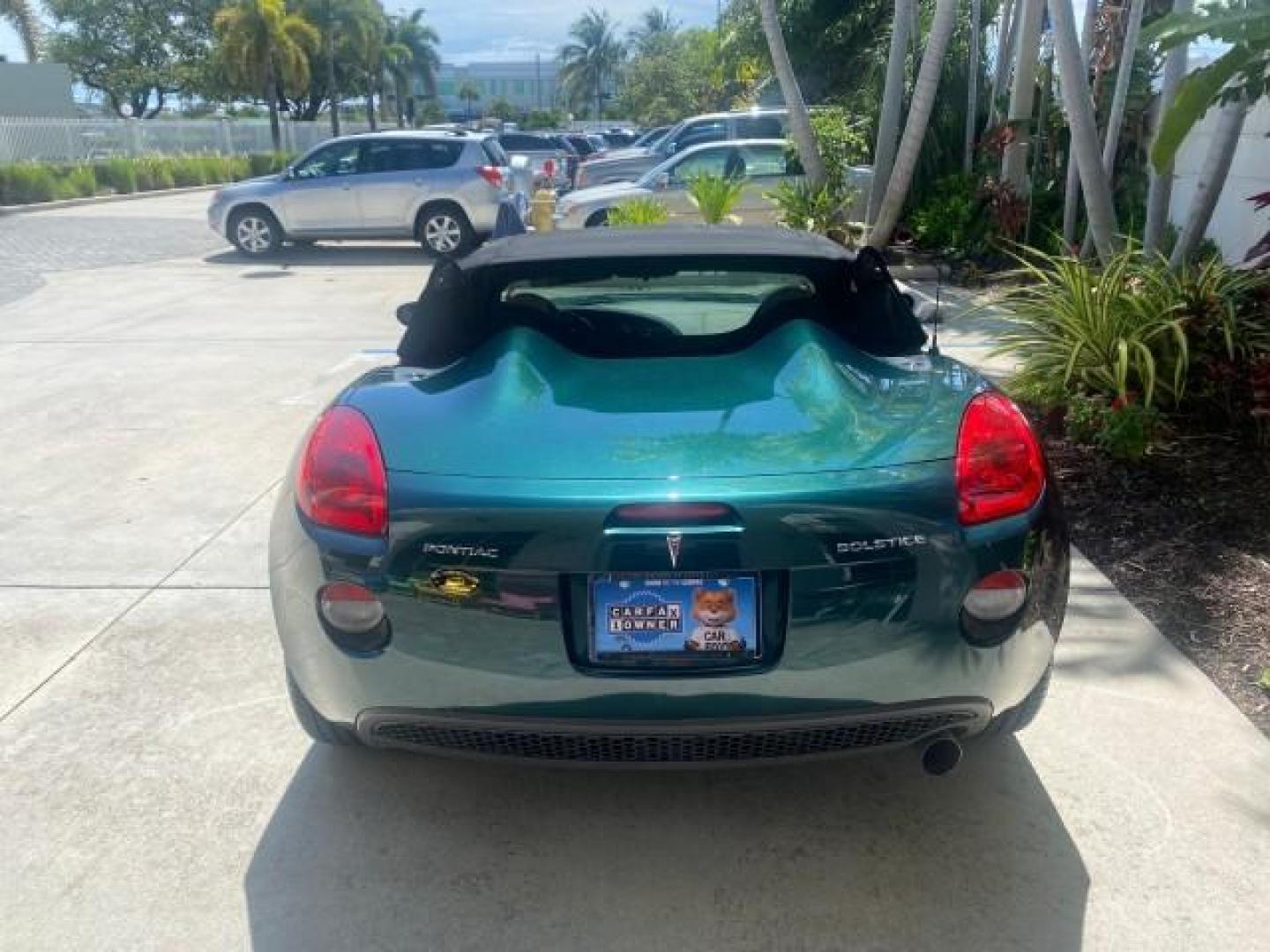 2006 Envious Emerald Green Met /Steel/Sand Pontiac Solstice 1 OWNER LOW MILES 17,744 (1G2MB35B76Y) with an Ecotec 2.4L DOHC 4-Cyl SFI Aluminum Engine engine, Manual transmission, located at 4701 North Dixie Hwy, Pompano Beach, FL, 33064, (954) 422-2889, 26.240938, -80.123474 - OUR WEBPAGE FLORIDACARS1.COM HAS OVER 100 PHOTOS AND FREE CARFAX LINK 2006 PONTIAC SOLSTICE VIN: 1G2MB35B76Y116186 1 G 2 M B 3 5 B 7 6 Y 1 1 6 1 8 6 CONVERTIBLE 2.4L I4 F DOHC GASOLINE REAR WHEEL DRIVE Top Features Alloy Wheels Bluetooth Technology Convenience Package Leather Seats Soft Top Basic Fe - Photo#66