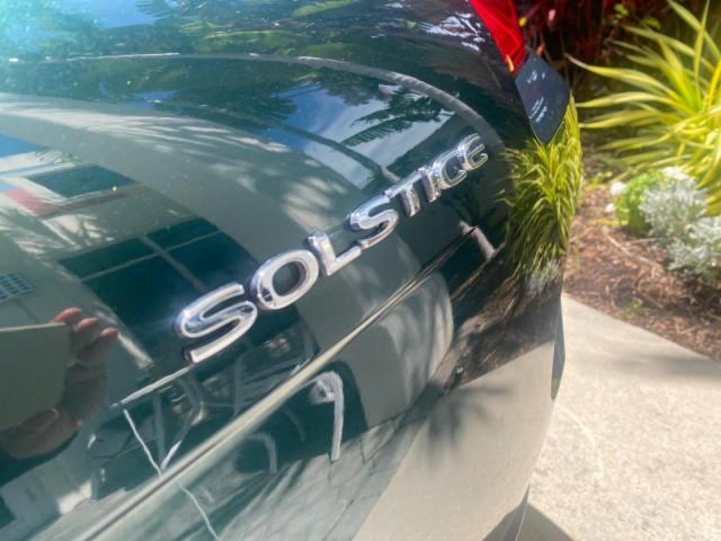 2006 Envious Emerald Green Met /Steel/Sand Pontiac Solstice 1 OWNER LOW MILES 17,744 (1G2MB35B76Y) with an Ecotec 2.4L DOHC 4-Cyl SFI Aluminum Engine engine, Manual transmission, located at 4701 North Dixie Hwy, Pompano Beach, FL, 33064, (954) 422-2889, 26.240938, -80.123474 - OUR WEBPAGE FLORIDACARS1.COM HAS OVER 100 PHOTOS AND FREE CARFAX LINK 2006 PONTIAC SOLSTICE VIN: 1G2MB35B76Y116186 1 G 2 M B 3 5 B 7 6 Y 1 1 6 1 8 6 CONVERTIBLE 2.4L I4 F DOHC GASOLINE REAR WHEEL DRIVE Top Features Alloy Wheels Bluetooth Technology Convenience Package Leather Seats Soft Top Basic Fe - Photo#69