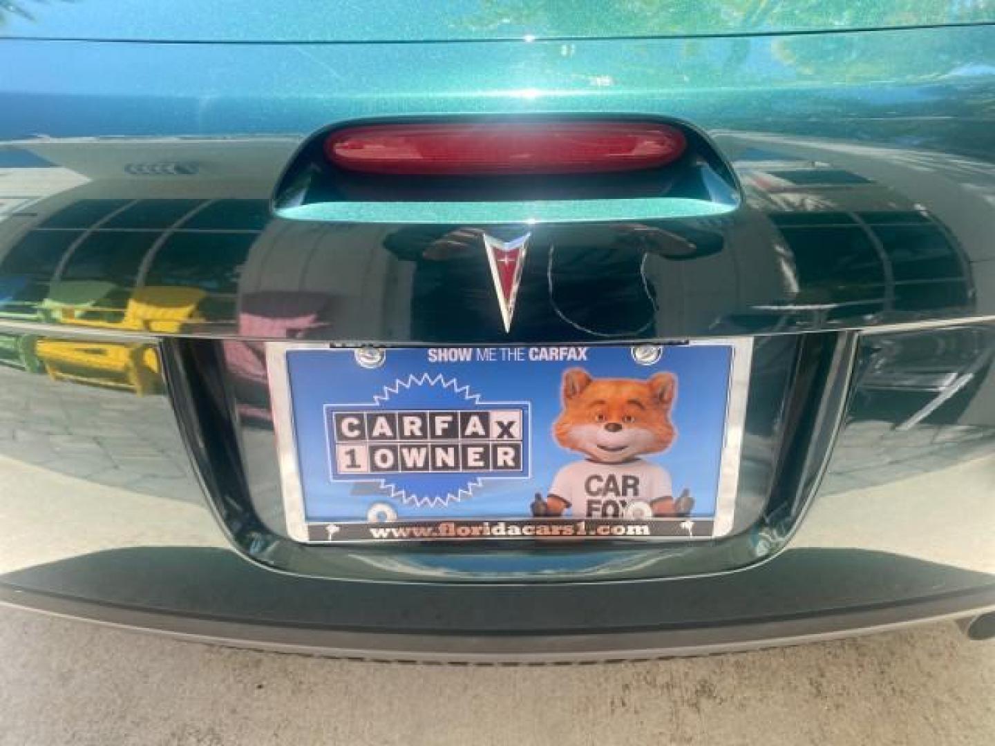 2006 Envious Emerald Green Met /Steel/Sand Pontiac Solstice 1 OWNER LOW MILES 17,744 (1G2MB35B76Y) with an Ecotec 2.4L DOHC 4-Cyl SFI Aluminum Engine engine, Manual transmission, located at 4701 North Dixie Hwy, Pompano Beach, FL, 33064, (954) 422-2889, 26.240938, -80.123474 - OUR WEBPAGE FLORIDACARS1.COM HAS OVER 100 PHOTOS AND FREE CARFAX LINK 2006 PONTIAC SOLSTICE VIN: 1G2MB35B76Y116186 1 G 2 M B 3 5 B 7 6 Y 1 1 6 1 8 6 CONVERTIBLE 2.4L I4 F DOHC GASOLINE REAR WHEEL DRIVE Top Features Alloy Wheels Bluetooth Technology Convenience Package Leather Seats Soft Top Basic Fe - Photo#73