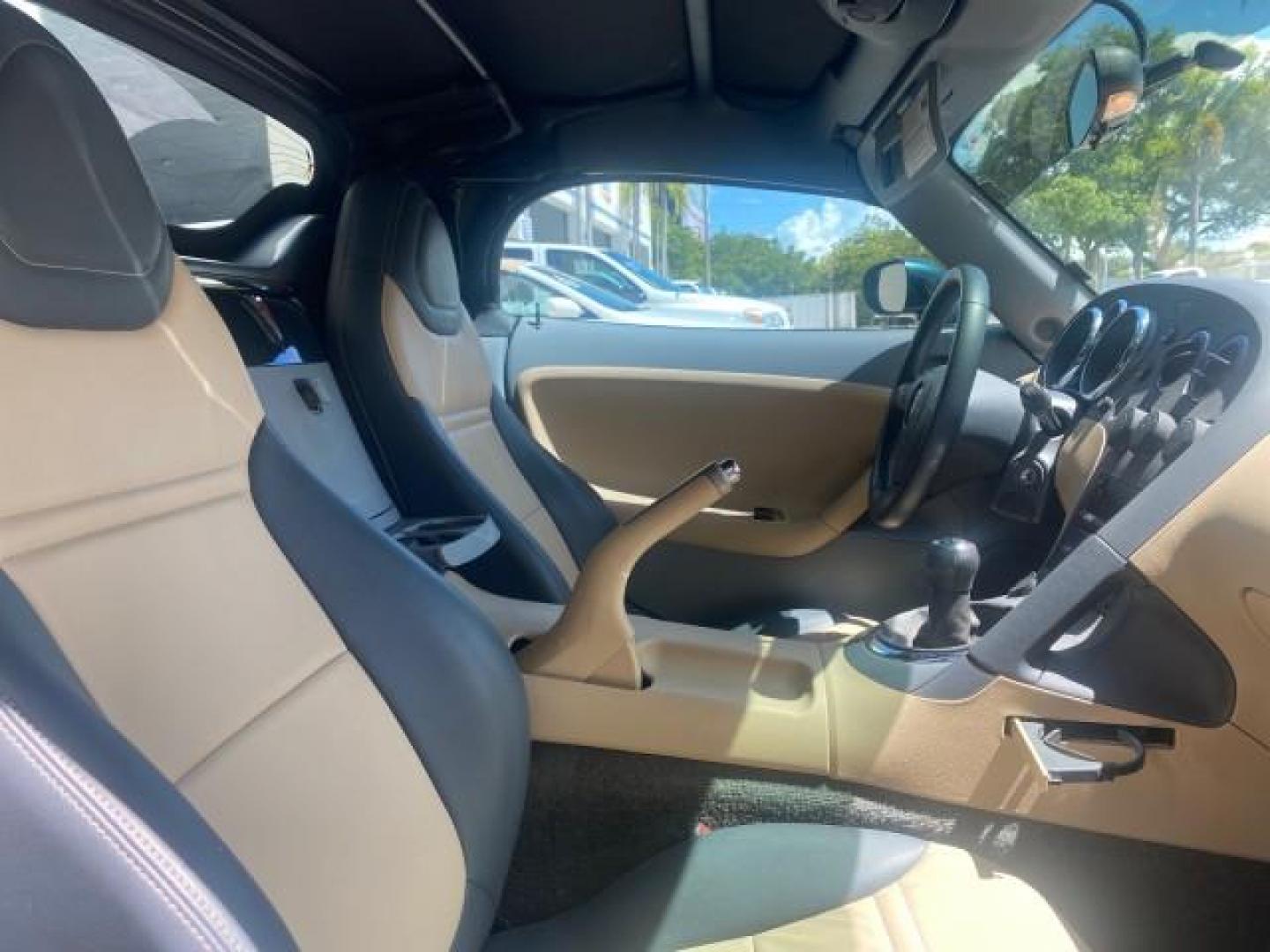 2006 Envious Emerald Green Met /Steel/Sand Pontiac Solstice 1 OWNER LOW MILES 17,744 (1G2MB35B76Y) with an Ecotec 2.4L DOHC 4-Cyl SFI Aluminum Engine engine, Manual transmission, located at 4701 North Dixie Hwy, Pompano Beach, FL, 33064, (954) 422-2889, 26.240938, -80.123474 - OUR WEBPAGE FLORIDACARS1.COM HAS OVER 100 PHOTOS AND FREE CARFAX LINK 2006 PONTIAC SOLSTICE VIN: 1G2MB35B76Y116186 1 G 2 M B 3 5 B 7 6 Y 1 1 6 1 8 6 CONVERTIBLE 2.4L I4 F DOHC GASOLINE REAR WHEEL DRIVE Top Features Alloy Wheels Bluetooth Technology Convenience Package Leather Seats Soft Top Basic Fe - Photo#82