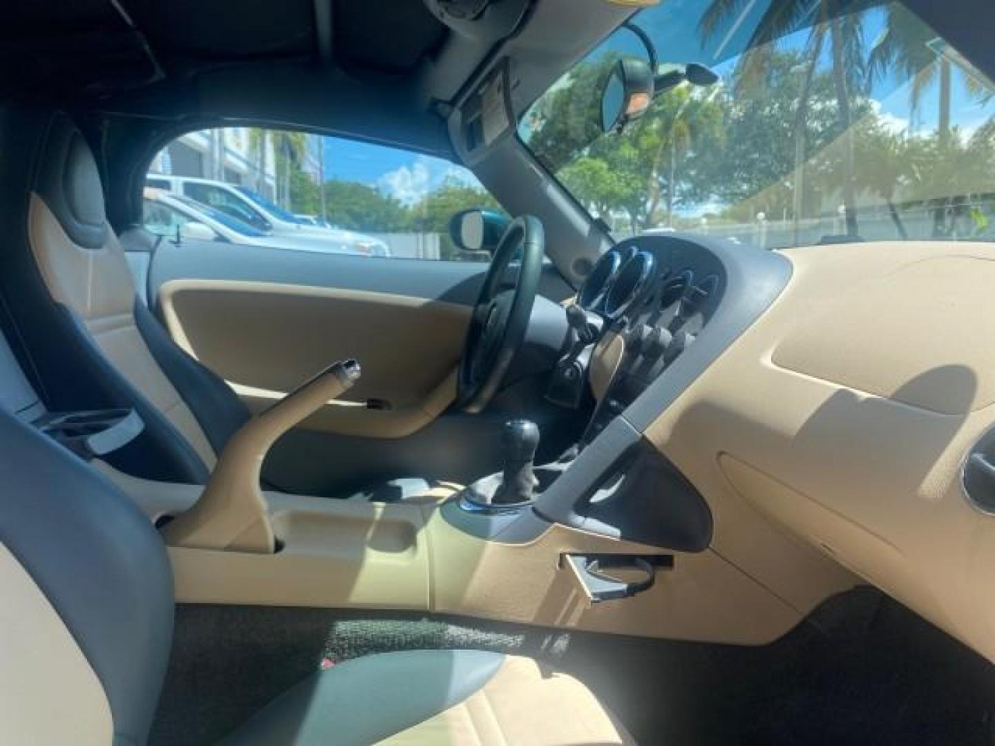 2006 Envious Emerald Green Met /Steel/Sand Pontiac Solstice 1 OWNER LOW MILES 17,744 (1G2MB35B76Y) with an Ecotec 2.4L DOHC 4-Cyl SFI Aluminum Engine engine, Manual transmission, located at 4701 North Dixie Hwy, Pompano Beach, FL, 33064, (954) 422-2889, 26.240938, -80.123474 - OUR WEBPAGE FLORIDACARS1.COM HAS OVER 100 PHOTOS AND FREE CARFAX LINK 2006 PONTIAC SOLSTICE VIN: 1G2MB35B76Y116186 1 G 2 M B 3 5 B 7 6 Y 1 1 6 1 8 6 CONVERTIBLE 2.4L I4 F DOHC GASOLINE REAR WHEEL DRIVE Top Features Alloy Wheels Bluetooth Technology Convenience Package Leather Seats Soft Top Basic Fe - Photo#84