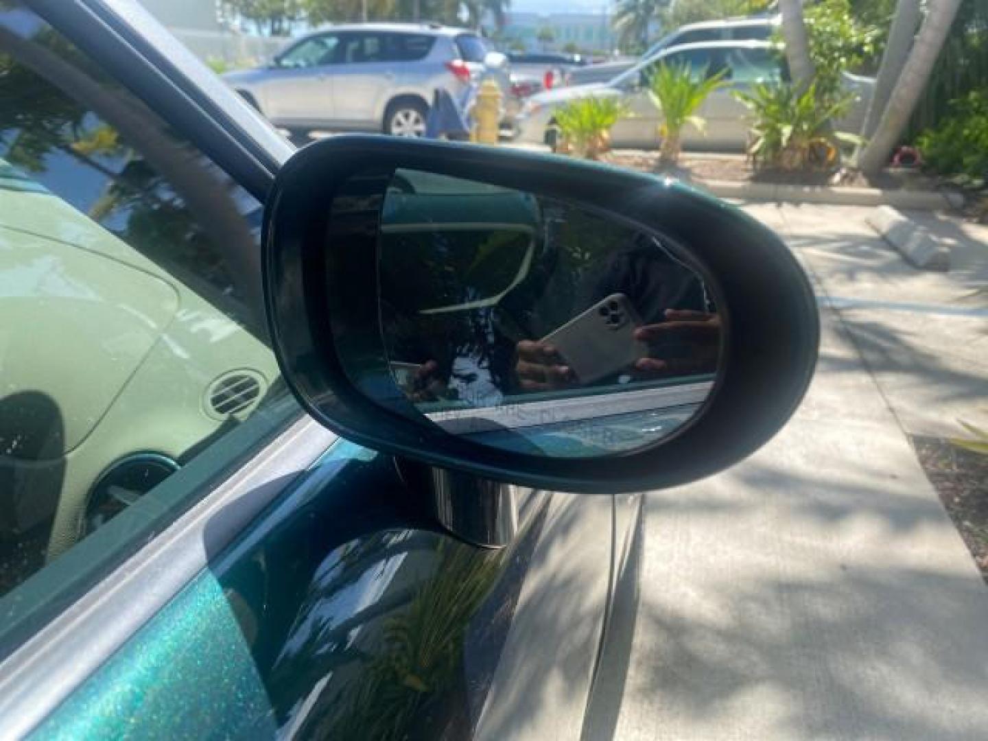 2006 Envious Emerald Green Met /Steel/Sand Pontiac Solstice 1 OWNER LOW MILES 17,744 (1G2MB35B76Y) with an Ecotec 2.4L DOHC 4-Cyl SFI Aluminum Engine engine, Manual transmission, located at 4701 North Dixie Hwy, Pompano Beach, FL, 33064, (954) 422-2889, 26.240938, -80.123474 - OUR WEBPAGE FLORIDACARS1.COM HAS OVER 100 PHOTOS AND FREE CARFAX LINK 2006 PONTIAC SOLSTICE VIN: 1G2MB35B76Y116186 1 G 2 M B 3 5 B 7 6 Y 1 1 6 1 8 6 CONVERTIBLE 2.4L I4 F DOHC GASOLINE REAR WHEEL DRIVE Top Features Alloy Wheels Bluetooth Technology Convenience Package Leather Seats Soft Top Basic Fe - Photo#89
