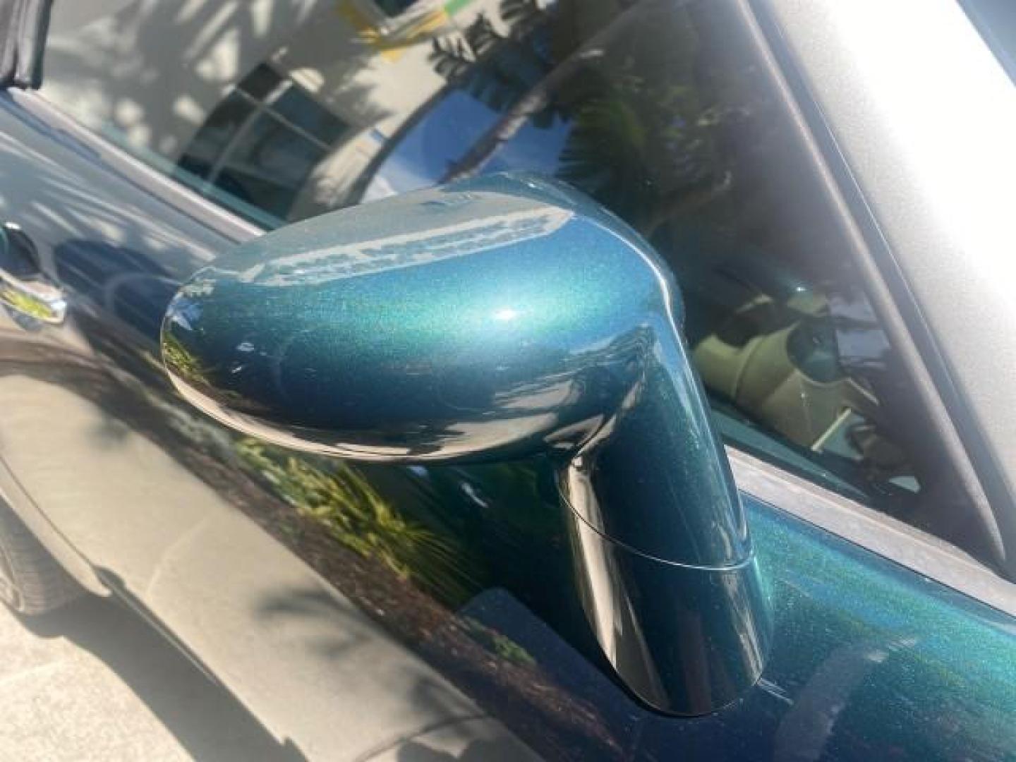 2006 Envious Emerald Green Met /Steel/Sand Pontiac Solstice 1 OWNER LOW MILES 17,744 (1G2MB35B76Y) with an Ecotec 2.4L DOHC 4-Cyl SFI Aluminum Engine engine, Manual transmission, located at 4701 North Dixie Hwy, Pompano Beach, FL, 33064, (954) 422-2889, 26.240938, -80.123474 - OUR WEBPAGE FLORIDACARS1.COM HAS OVER 100 PHOTOS AND FREE CARFAX LINK 2006 PONTIAC SOLSTICE VIN: 1G2MB35B76Y116186 1 G 2 M B 3 5 B 7 6 Y 1 1 6 1 8 6 CONVERTIBLE 2.4L I4 F DOHC GASOLINE REAR WHEEL DRIVE Top Features Alloy Wheels Bluetooth Technology Convenience Package Leather Seats Soft Top Basic Fe - Photo#90
