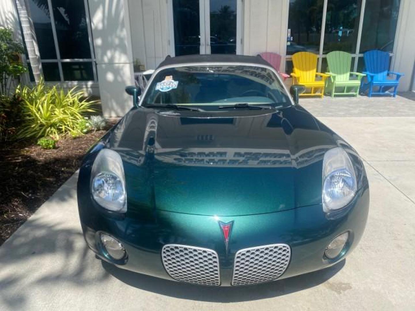 2006 Envious Emerald Green Met /Steel/Sand Pontiac Solstice 1 OWNER LOW MILES 17,744 (1G2MB35B76Y) with an Ecotec 2.4L DOHC 4-Cyl SFI Aluminum Engine engine, Manual transmission, located at 4701 North Dixie Hwy, Pompano Beach, FL, 33064, (954) 422-2889, 26.240938, -80.123474 - OUR WEBPAGE FLORIDACARS1.COM HAS OVER 100 PHOTOS AND FREE CARFAX LINK 2006 PONTIAC SOLSTICE VIN: 1G2MB35B76Y116186 1 G 2 M B 3 5 B 7 6 Y 1 1 6 1 8 6 CONVERTIBLE 2.4L I4 F DOHC GASOLINE REAR WHEEL DRIVE Top Features Alloy Wheels Bluetooth Technology Convenience Package Leather Seats Soft Top Basic Fe - Photo#98