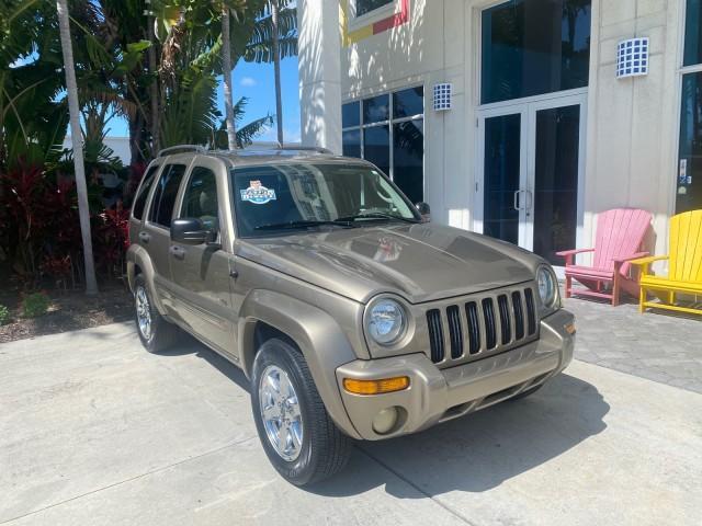 2003 Light Khaki Metallic /Dark Slate Gray Jeep Liberty Limited 1 OWNER LOW MILES 71,151 (1J4GK58KX3W) with an 3.7L V6 Engine engine, Automatic transmission, located at 4701 North Dixie Hwy, Pompano Beach, FL, 33064, (954) 422-2889, 26.240938, -80.123474 - OUR WEBPAGE FLORIDACARS1.COM HAS OVER 100 PHOTOS AND FREE CARFAX LINK 2003 JEEP LIBERTY LIMITED VIN: 1J4GK58KX3W598220 1 J 4 G K 5 8 K X 3 W 5 9 8 2 2 0 4 DOOR WAGON/SPORT UTILITY 3.7L V6 F GASOLINE REAR WHEEL DRIVE Top Features Alloy Wheels Leather Seats Tow Hitch Basic Features AM/FM Stereo Air Co - Photo#1