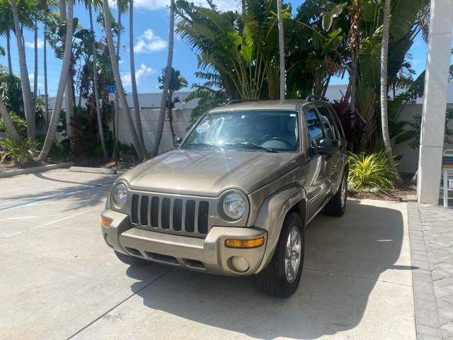 2003 Light Khaki Metallic /Dark Slate Gray Jeep Liberty Limited 1 OWNER LOW MILES 71,151 (1J4GK58KX3W) with an 3.7L V6 Engine engine, Automatic transmission, located at 4701 North Dixie Hwy, Pompano Beach, FL, 33064, (954) 422-2889, 26.240938, -80.123474 - OUR WEBPAGE FLORIDACARS1.COM HAS OVER 100 PHOTOS AND FREE CARFAX LINK 2003 JEEP LIBERTY LIMITED VIN: 1J4GK58KX3W598220 1 J 4 G K 5 8 K X 3 W 5 9 8 2 2 0 4 DOOR WAGON/SPORT UTILITY 3.7L V6 F GASOLINE REAR WHEEL DRIVE Top Features Alloy Wheels Leather Seats Tow Hitch Basic Features AM/FM Stereo Air Co - Photo#3