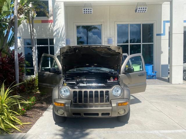 2003 Light Khaki Metallic /Dark Slate Gray Jeep Liberty Limited 1 OWNER LOW MILES 71,151 (1J4GK58KX3W) with an 3.7L V6 Engine engine, Automatic transmission, located at 4701 North Dixie Hwy, Pompano Beach, FL, 33064, (954) 422-2889, 26.240938, -80.123474 - OUR WEBPAGE FLORIDACARS1.COM HAS OVER 100 PHOTOS AND FREE CARFAX LINK 2003 JEEP LIBERTY LIMITED VIN: 1J4GK58KX3W598220 1 J 4 G K 5 8 K X 3 W 5 9 8 2 2 0 4 DOOR WAGON/SPORT UTILITY 3.7L V6 F GASOLINE REAR WHEEL DRIVE Top Features Alloy Wheels Leather Seats Tow Hitch Basic Features AM/FM Stereo Air Co - Photo#16