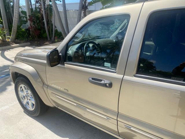 2003 Light Khaki Metallic /Dark Slate Gray Jeep Liberty Limited 1 OWNER LOW MILES 71,151 (1J4GK58KX3W) with an 3.7L V6 Engine engine, Automatic transmission, located at 4701 North Dixie Hwy, Pompano Beach, FL, 33064, (954) 422-2889, 26.240938, -80.123474 - OUR WEBPAGE FLORIDACARS1.COM HAS OVER 100 PHOTOS AND FREE CARFAX LINK 2003 JEEP LIBERTY LIMITED VIN: 1J4GK58KX3W598220 1 J 4 G K 5 8 K X 3 W 5 9 8 2 2 0 4 DOOR WAGON/SPORT UTILITY 3.7L V6 F GASOLINE REAR WHEEL DRIVE Top Features Alloy Wheels Leather Seats Tow Hitch Basic Features AM/FM Stereo Air Co - Photo#27