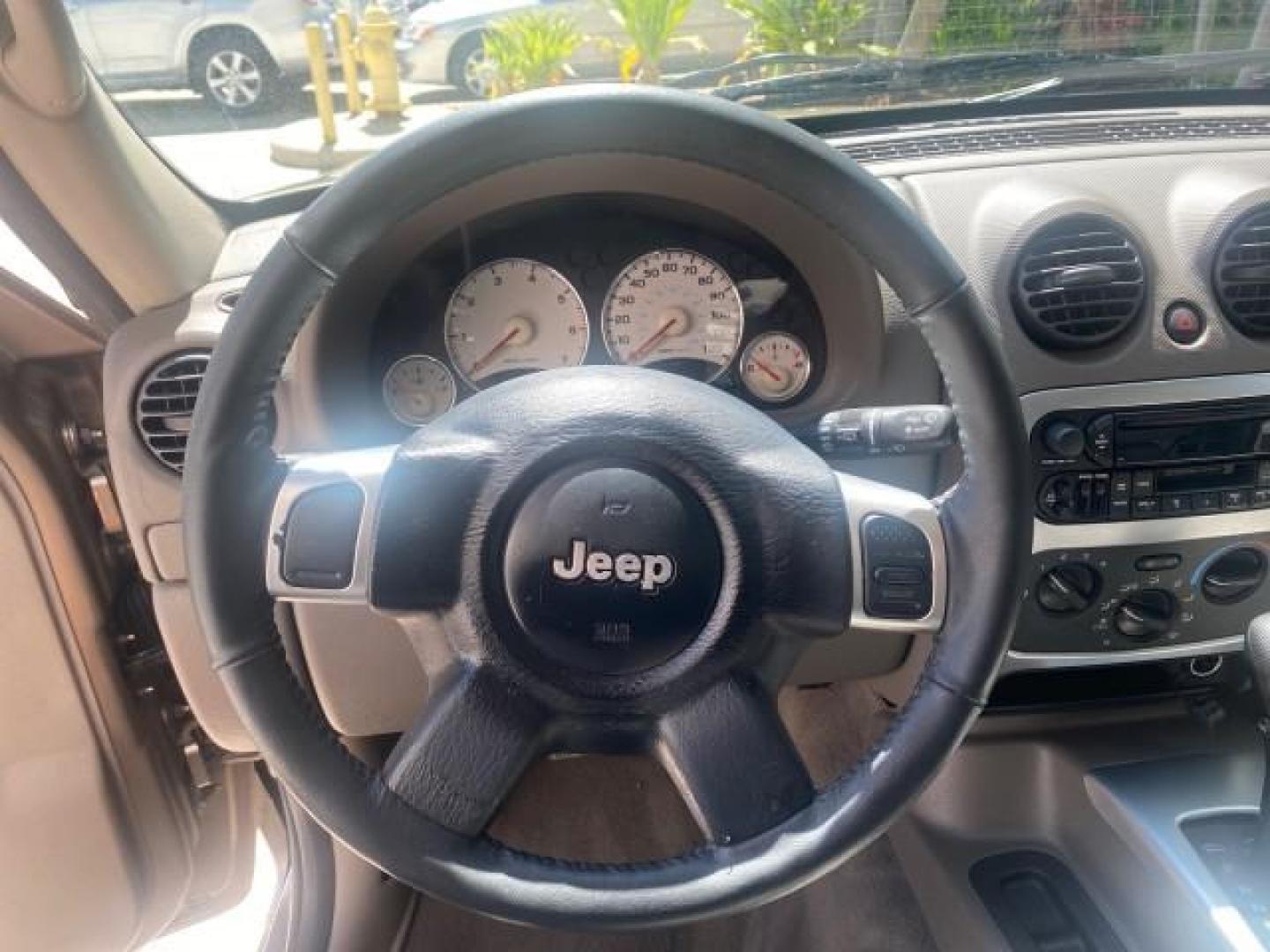 2003 Cactus Green Pearl Coat /Dark Slate Gray Jeep Liberty Limited 1 OWNER LOW MILES 71,149 (1J4GK58KX3W) with an 3.7L V6 Engine engine, Automatic transmission, located at 4701 North Dixie Hwy, Pompano Beach, FL, 33064, (954) 422-2889, 26.240938, -80.123474 - OUR WEBPAGE FLORIDACARS1.COM HAS OVER 100 PHOTOS AND FREE CARFAX LINK 2003 JEEP LIBERTY LIMITED VIN: 1J4GK58KX3W598220 1 J 4 G K 5 8 K X 3 W 5 9 8 2 2 0 4 DOOR WAGON/SPORT UTILITY 3.7L V6 F GASOLINE REAR WHEEL DRIVE Top Features Alloy Wheels Leather Seats Tow Hitch Basic Features AM/FM Stereo Air Co - Photo#39
