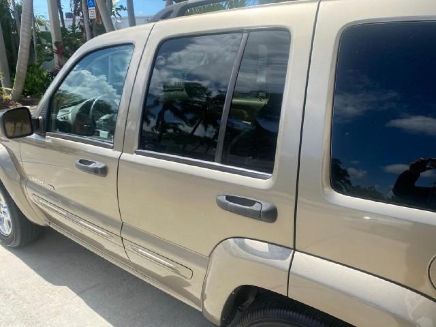 2003 Cactus Green Pearl Coat /Dark Slate Gray Jeep Liberty Limited 1 OWNER LOW MILES 71,149 (1J4GK58KX3W) with an 3.7L V6 Engine engine, Automatic transmission, located at 4701 North Dixie Hwy, Pompano Beach, FL, 33064, (954) 422-2889, 26.240938, -80.123474 - OUR WEBPAGE FLORIDACARS1.COM HAS OVER 100 PHOTOS AND FREE CARFAX LINK 2003 JEEP LIBERTY LIMITED VIN: 1J4GK58KX3W598220 1 J 4 G K 5 8 K X 3 W 5 9 8 2 2 0 4 DOOR WAGON/SPORT UTILITY 3.7L V6 F GASOLINE REAR WHEEL DRIVE Top Features Alloy Wheels Leather Seats Tow Hitch Basic Features AM/FM Stereo Air Co - Photo#61
