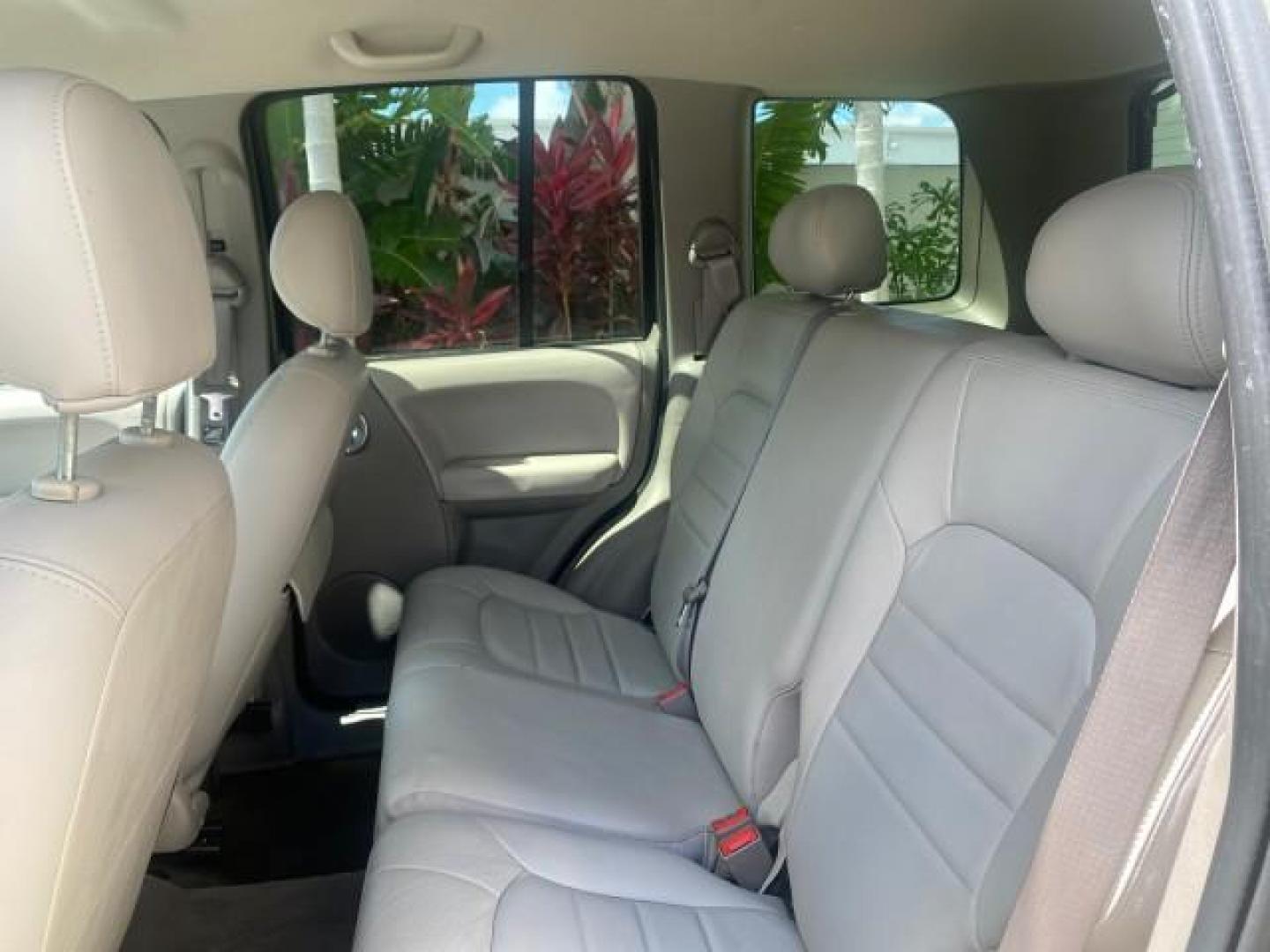 2003 Cactus Green Pearl Coat /Dark Slate Gray Jeep Liberty Limited 1 OWNER LOW MILES 71,149 (1J4GK58KX3W) with an 3.7L V6 Engine engine, Automatic transmission, located at 4701 North Dixie Hwy, Pompano Beach, FL, 33064, (954) 422-2889, 26.240938, -80.123474 - OUR WEBPAGE FLORIDACARS1.COM HAS OVER 100 PHOTOS AND FREE CARFAX LINK 2003 JEEP LIBERTY LIMITED VIN: 1J4GK58KX3W598220 1 J 4 G K 5 8 K X 3 W 5 9 8 2 2 0 4 DOOR WAGON/SPORT UTILITY 3.7L V6 F GASOLINE REAR WHEEL DRIVE Top Features Alloy Wheels Leather Seats Tow Hitch Basic Features AM/FM Stereo Air Co - Photo#64