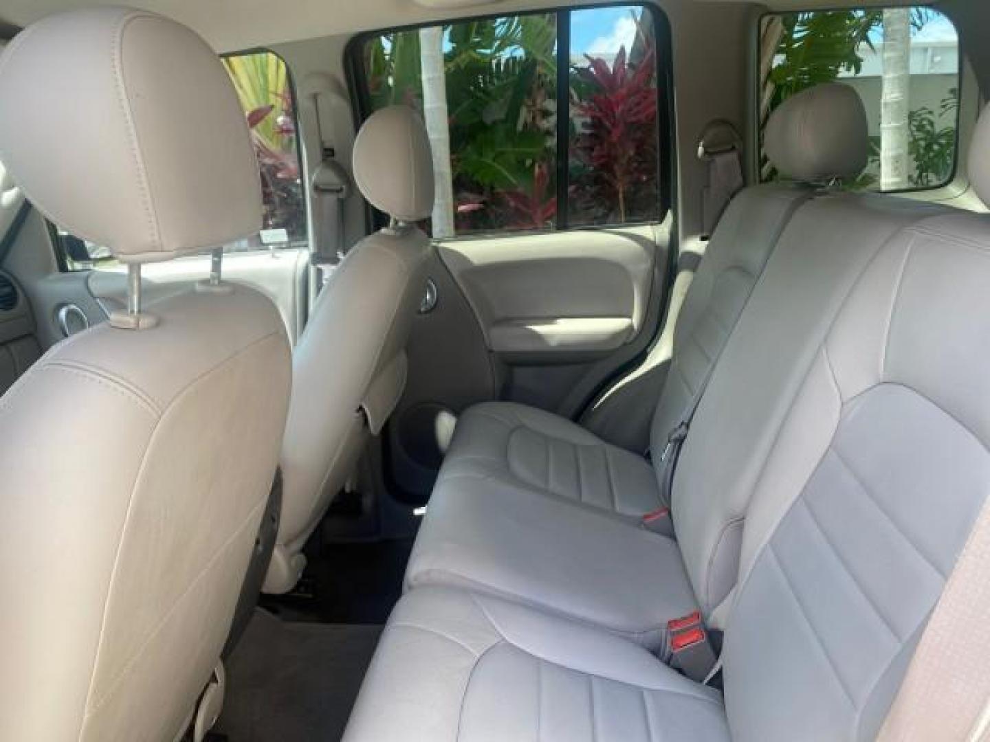 2003 Cactus Green Pearl Coat /Dark Slate Gray Jeep Liberty Limited 1 OWNER LOW MILES 71,149 (1J4GK58KX3W) with an 3.7L V6 Engine engine, Automatic transmission, located at 4701 North Dixie Hwy, Pompano Beach, FL, 33064, (954) 422-2889, 26.240938, -80.123474 - OUR WEBPAGE FLORIDACARS1.COM HAS OVER 100 PHOTOS AND FREE CARFAX LINK 2003 JEEP LIBERTY LIMITED VIN: 1J4GK58KX3W598220 1 J 4 G K 5 8 K X 3 W 5 9 8 2 2 0 4 DOOR WAGON/SPORT UTILITY 3.7L V6 F GASOLINE REAR WHEEL DRIVE Top Features Alloy Wheels Leather Seats Tow Hitch Basic Features AM/FM Stereo Air Co - Photo#66