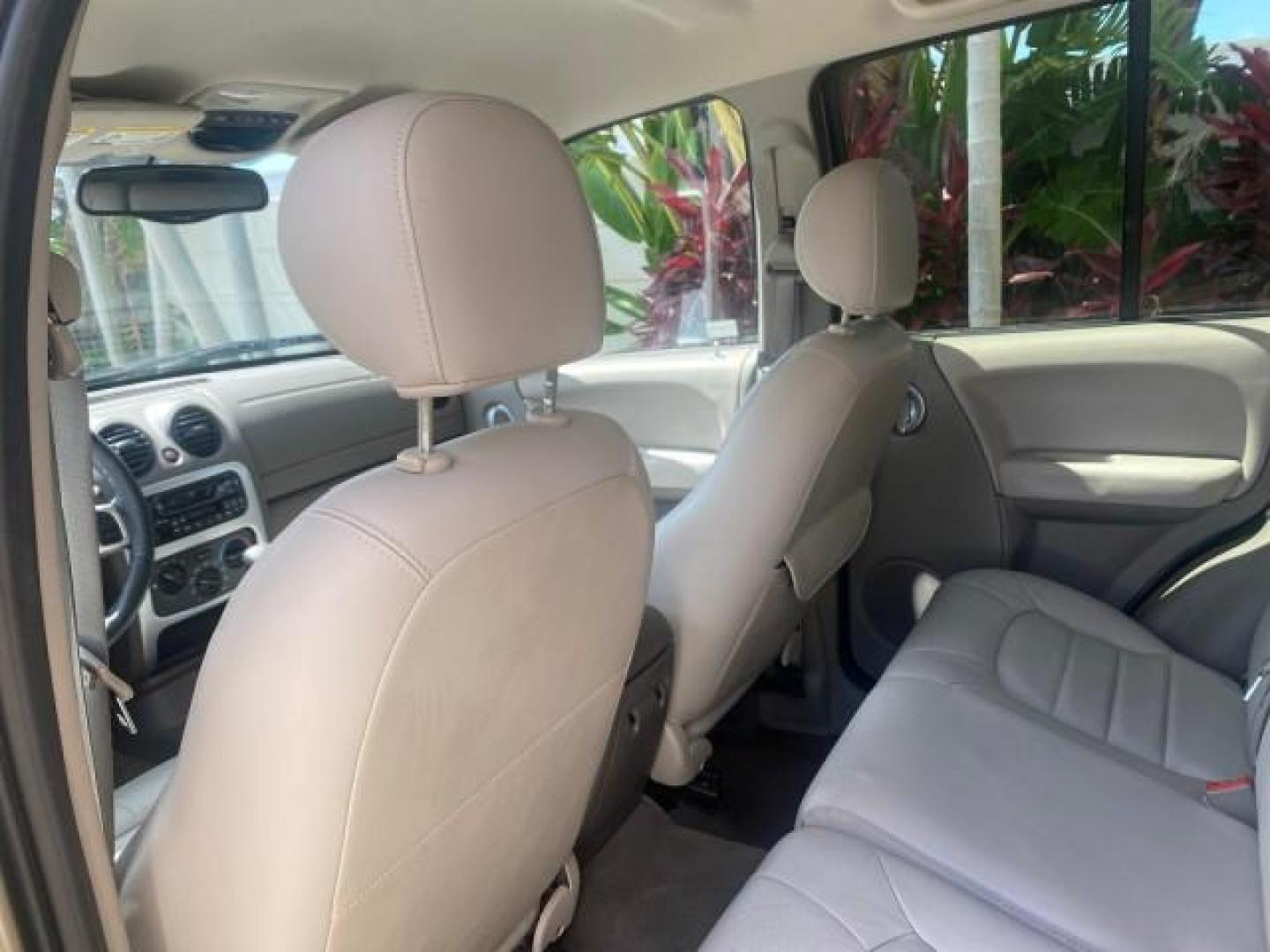 2003 Cactus Green Pearl Coat /Dark Slate Gray Jeep Liberty Limited 1 OWNER LOW MILES 71,149 (1J4GK58KX3W) with an 3.7L V6 Engine engine, Automatic transmission, located at 4701 North Dixie Hwy, Pompano Beach, FL, 33064, (954) 422-2889, 26.240938, -80.123474 - OUR WEBPAGE FLORIDACARS1.COM HAS OVER 100 PHOTOS AND FREE CARFAX LINK 2003 JEEP LIBERTY LIMITED VIN: 1J4GK58KX3W598220 1 J 4 G K 5 8 K X 3 W 5 9 8 2 2 0 4 DOOR WAGON/SPORT UTILITY 3.7L V6 F GASOLINE REAR WHEEL DRIVE Top Features Alloy Wheels Leather Seats Tow Hitch Basic Features AM/FM Stereo Air Co - Photo#67