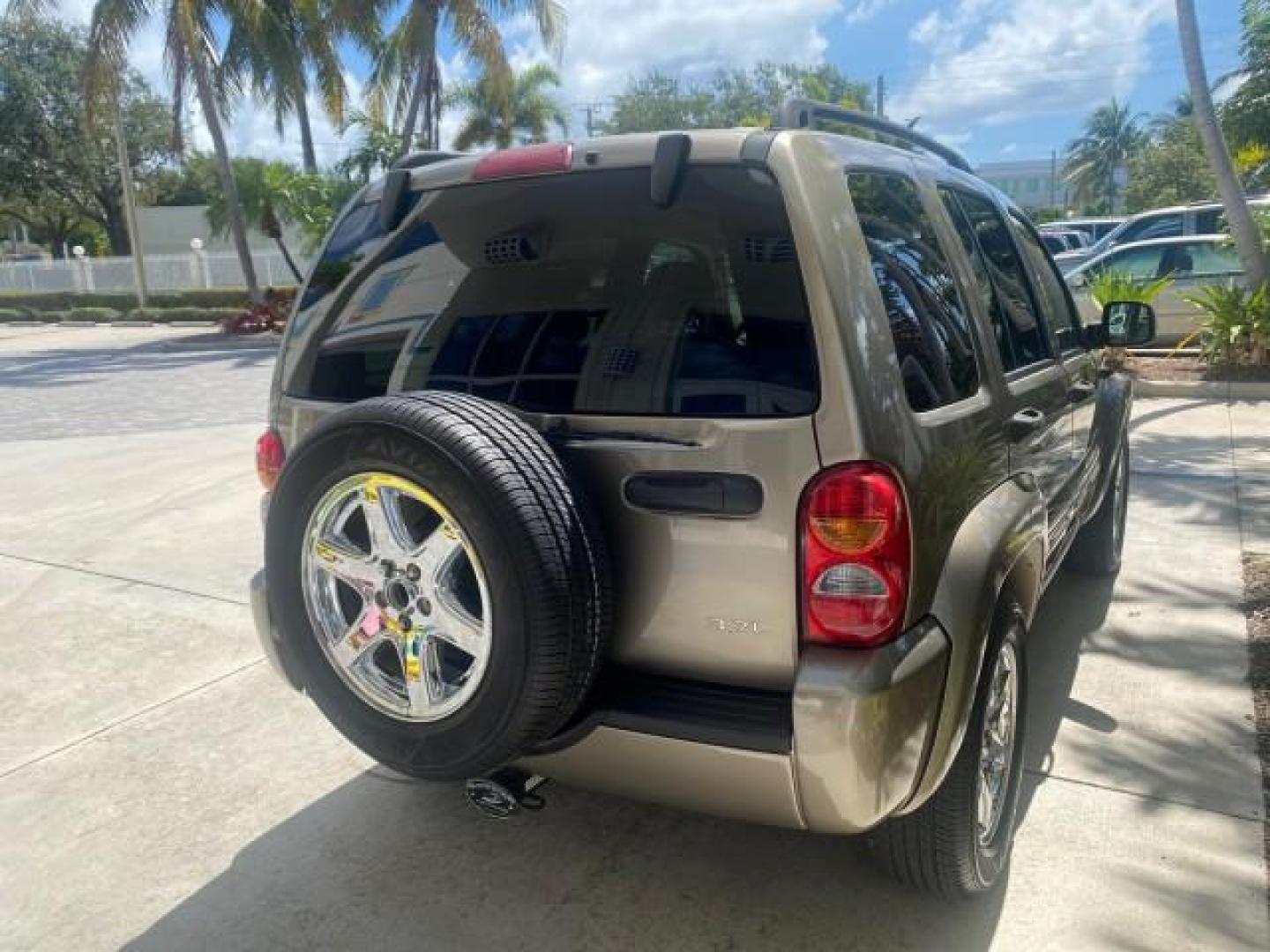 2003 Cactus Green Pearl Coat /Dark Slate Gray Jeep Liberty Limited 1 OWNER LOW MILES 71,149 (1J4GK58KX3W) with an 3.7L V6 Engine engine, Automatic transmission, located at 4701 North Dixie Hwy, Pompano Beach, FL, 33064, (954) 422-2889, 26.240938, -80.123474 - OUR WEBPAGE FLORIDACARS1.COM HAS OVER 100 PHOTOS AND FREE CARFAX LINK 2003 JEEP LIBERTY LIMITED VIN: 1J4GK58KX3W598220 1 J 4 G K 5 8 K X 3 W 5 9 8 2 2 0 4 DOOR WAGON/SPORT UTILITY 3.7L V6 F GASOLINE REAR WHEEL DRIVE Top Features Alloy Wheels Leather Seats Tow Hitch Basic Features AM/FM Stereo Air Co - Photo#77