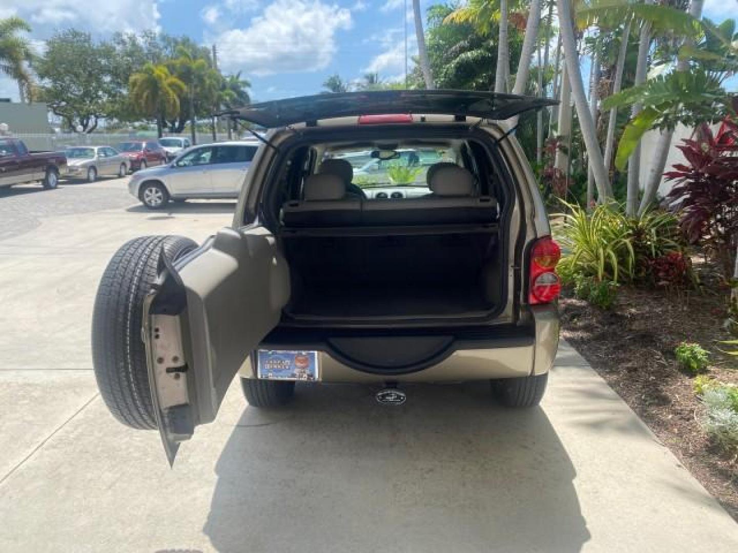 2003 Cactus Green Pearl Coat /Dark Slate Gray Jeep Liberty Limited 1 OWNER LOW MILES 71,149 (1J4GK58KX3W) with an 3.7L V6 Engine engine, Automatic transmission, located at 4701 North Dixie Hwy, Pompano Beach, FL, 33064, (954) 422-2889, 26.240938, -80.123474 - OUR WEBPAGE FLORIDACARS1.COM HAS OVER 100 PHOTOS AND FREE CARFAX LINK 2003 JEEP LIBERTY LIMITED VIN: 1J4GK58KX3W598220 1 J 4 G K 5 8 K X 3 W 5 9 8 2 2 0 4 DOOR WAGON/SPORT UTILITY 3.7L V6 F GASOLINE REAR WHEEL DRIVE Top Features Alloy Wheels Leather Seats Tow Hitch Basic Features AM/FM Stereo Air Co - Photo#82