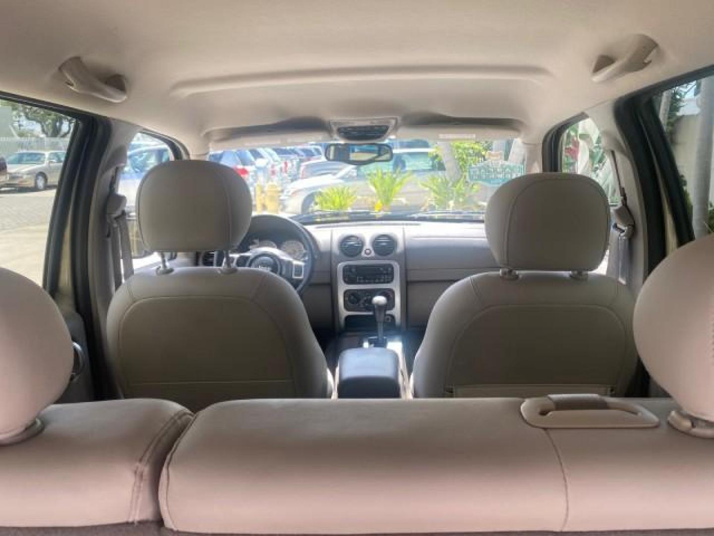 2003 Cactus Green Pearl Coat /Dark Slate Gray Jeep Liberty Limited 1 OWNER LOW MILES 71,149 (1J4GK58KX3W) with an 3.7L V6 Engine engine, Automatic transmission, located at 4701 North Dixie Hwy, Pompano Beach, FL, 33064, (954) 422-2889, 26.240938, -80.123474 - OUR WEBPAGE FLORIDACARS1.COM HAS OVER 100 PHOTOS AND FREE CARFAX LINK 2003 JEEP LIBERTY LIMITED VIN: 1J4GK58KX3W598220 1 J 4 G K 5 8 K X 3 W 5 9 8 2 2 0 4 DOOR WAGON/SPORT UTILITY 3.7L V6 F GASOLINE REAR WHEEL DRIVE Top Features Alloy Wheels Leather Seats Tow Hitch Basic Features AM/FM Stereo Air Co - Photo#85