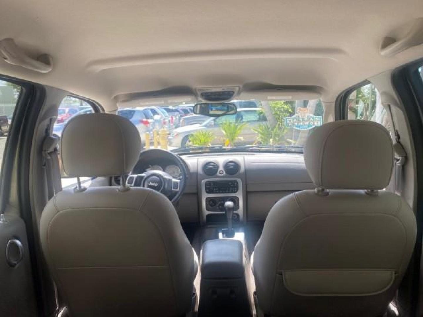 2003 Cactus Green Pearl Coat /Dark Slate Gray Jeep Liberty Limited 1 OWNER LOW MILES 71,149 (1J4GK58KX3W) with an 3.7L V6 Engine engine, Automatic transmission, located at 4701 North Dixie Hwy, Pompano Beach, FL, 33064, (954) 422-2889, 26.240938, -80.123474 - OUR WEBPAGE FLORIDACARS1.COM HAS OVER 100 PHOTOS AND FREE CARFAX LINK 2003 JEEP LIBERTY LIMITED VIN: 1J4GK58KX3W598220 1 J 4 G K 5 8 K X 3 W 5 9 8 2 2 0 4 DOOR WAGON/SPORT UTILITY 3.7L V6 F GASOLINE REAR WHEEL DRIVE Top Features Alloy Wheels Leather Seats Tow Hitch Basic Features AM/FM Stereo Air Co - Photo#86