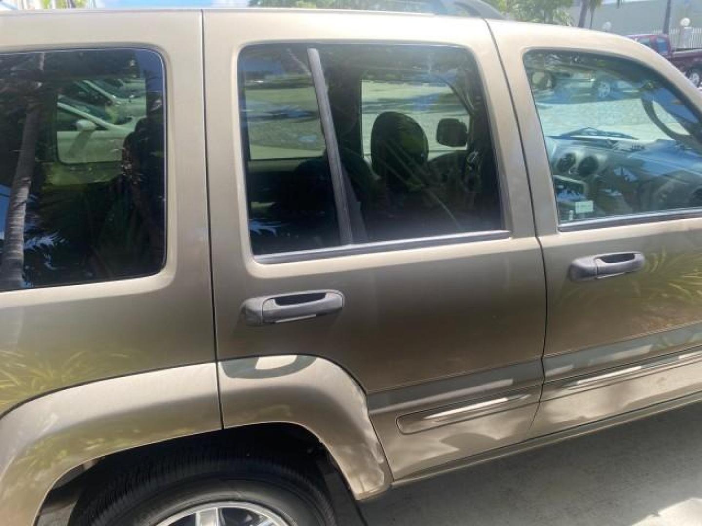 2003 Cactus Green Pearl Coat /Dark Slate Gray Jeep Liberty Limited 1 OWNER LOW MILES 71,149 (1J4GK58KX3W) with an 3.7L V6 Engine engine, Automatic transmission, located at 4701 North Dixie Hwy, Pompano Beach, FL, 33064, (954) 422-2889, 26.240938, -80.123474 - OUR WEBPAGE FLORIDACARS1.COM HAS OVER 100 PHOTOS AND FREE CARFAX LINK 2003 JEEP LIBERTY LIMITED VIN: 1J4GK58KX3W598220 1 J 4 G K 5 8 K X 3 W 5 9 8 2 2 0 4 DOOR WAGON/SPORT UTILITY 3.7L V6 F GASOLINE REAR WHEEL DRIVE Top Features Alloy Wheels Leather Seats Tow Hitch Basic Features AM/FM Stereo Air Co - Photo#89