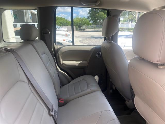 2003 Light Khaki Metallic /Dark Slate Gray Jeep Liberty Limited 1 OWNER LOW MILES 71,151 (1J4GK58KX3W) with an 3.7L V6 Engine engine, Automatic transmission, located at 4701 North Dixie Hwy, Pompano Beach, FL, 33064, (954) 422-2889, 26.240938, -80.123474 - OUR WEBPAGE FLORIDACARS1.COM HAS OVER 100 PHOTOS AND FREE CARFAX LINK 2003 JEEP LIBERTY LIMITED VIN: 1J4GK58KX3W598220 1 J 4 G K 5 8 K X 3 W 5 9 8 2 2 0 4 DOOR WAGON/SPORT UTILITY 3.7L V6 F GASOLINE REAR WHEEL DRIVE Top Features Alloy Wheels Leather Seats Tow Hitch Basic Features AM/FM Stereo Air Co - Photo#94